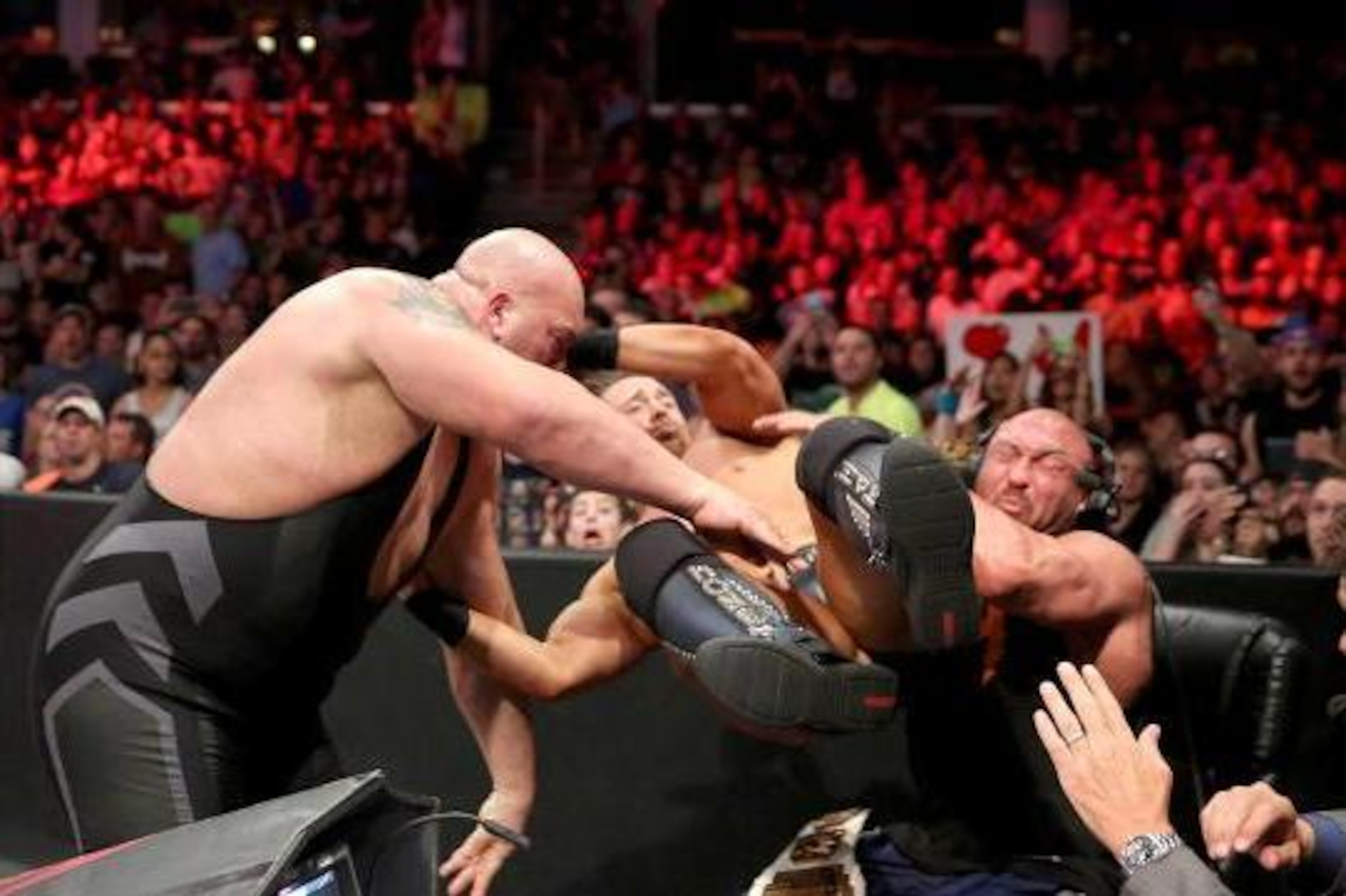 Big Show throws Miz into Ryback. Big Show throws Miz into Ryback.