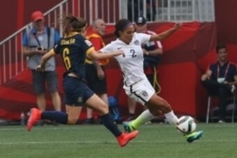 Jun 8, 2015; Winnipeg, Manitoba, CAN; United States forward Sydney Leroux (2) runs against Australia defender Servet Uzunlar (6) in a Group D soccer match in the 2015 women's World Cup at Winnipeg Stadium. Mandatory Credit: Bruce Fedyck-USA TODAY Sports