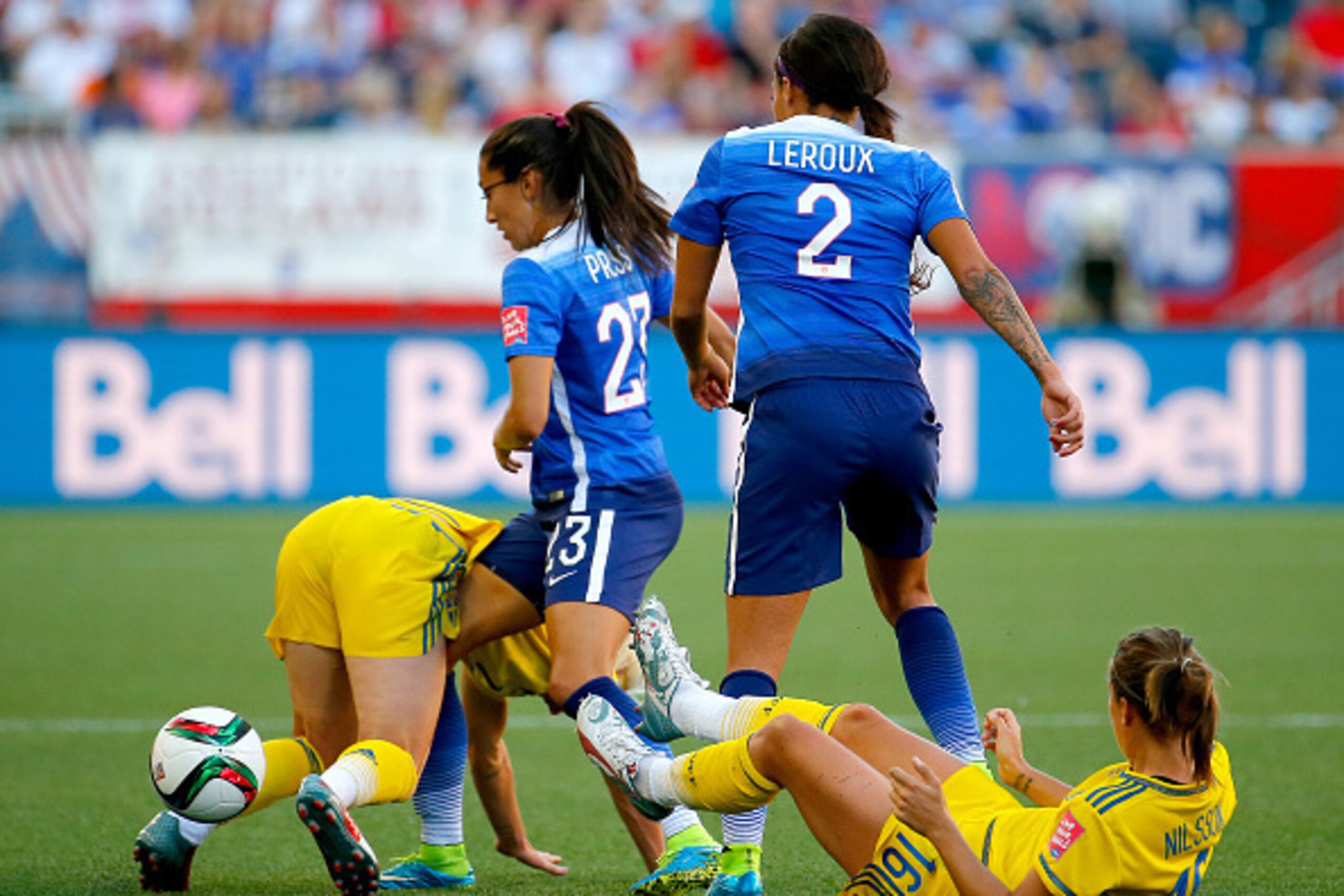 WINNIPEG, MB - JUNE 12: Caroline Seger #17 of Sweden goes after the ball against Christen Press #23 and Sydney Leroux #2 of the United States in the first half in the FIFA Women's World Cup Canada 2015 match at Winnipeg Stadium on June 12, 2015 in Winnip WINNIPEG, MB - JUNE 12: Caroline Seger #17 of Sweden goes after the ball against Christen Press #23 and Sydney Leroux #2 of the United States in the first half in the FIFA Women's World Cup Canada 2015 match at Winnipeg Stadium on June 12, 2015 in Winnip