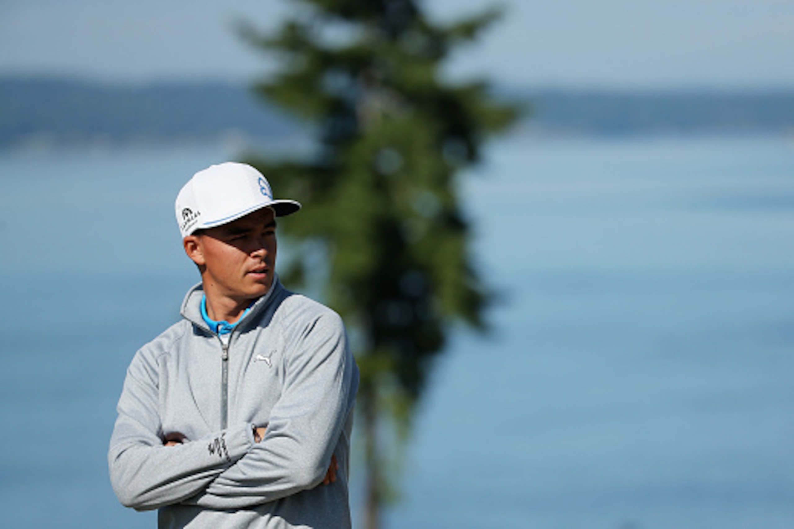 UNIVERSITY PLACE, WA - JUNE 17:  Rickie Fowler of the United States looks on during a practice round prior to the start of the 115th U.S. Open Championship at Chambers Bay on June 17, 2015 in University Place, Washington.  (Photo by Mike Ehrmann/Getty Ima