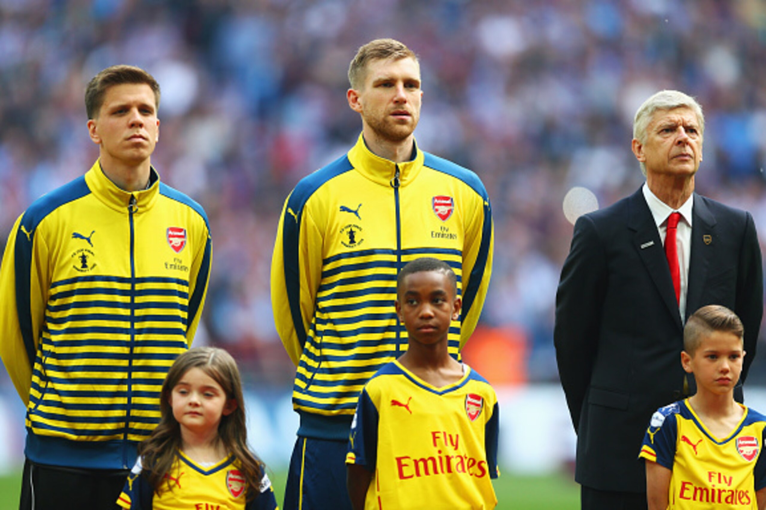 LONDON, ENGLAND - MAY 30:  (L-R) Wojciech Szczesny, Per Mertesacker of Arsenal and Arsene Wenger manager of Arsenal look on prior to the FA Cup Final between Aston Villa and Arsenal at Wembley Stadium on May 30, 2015 in London, England.  (Photo by Paul Gi