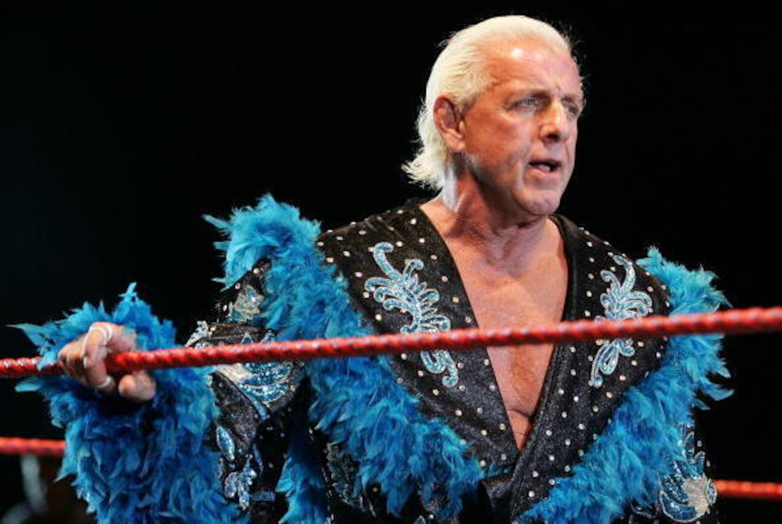 PERTH, AUSTRALIA - NOVEMBER 24:  Ric Flair looks on while awaiting the entrance of Hulk Hogan during the Hulkamania Tour at the Burswood Dome on November 24, 2009 in Perth, Australia.  (Photo by Paul Kane/Getty Images)