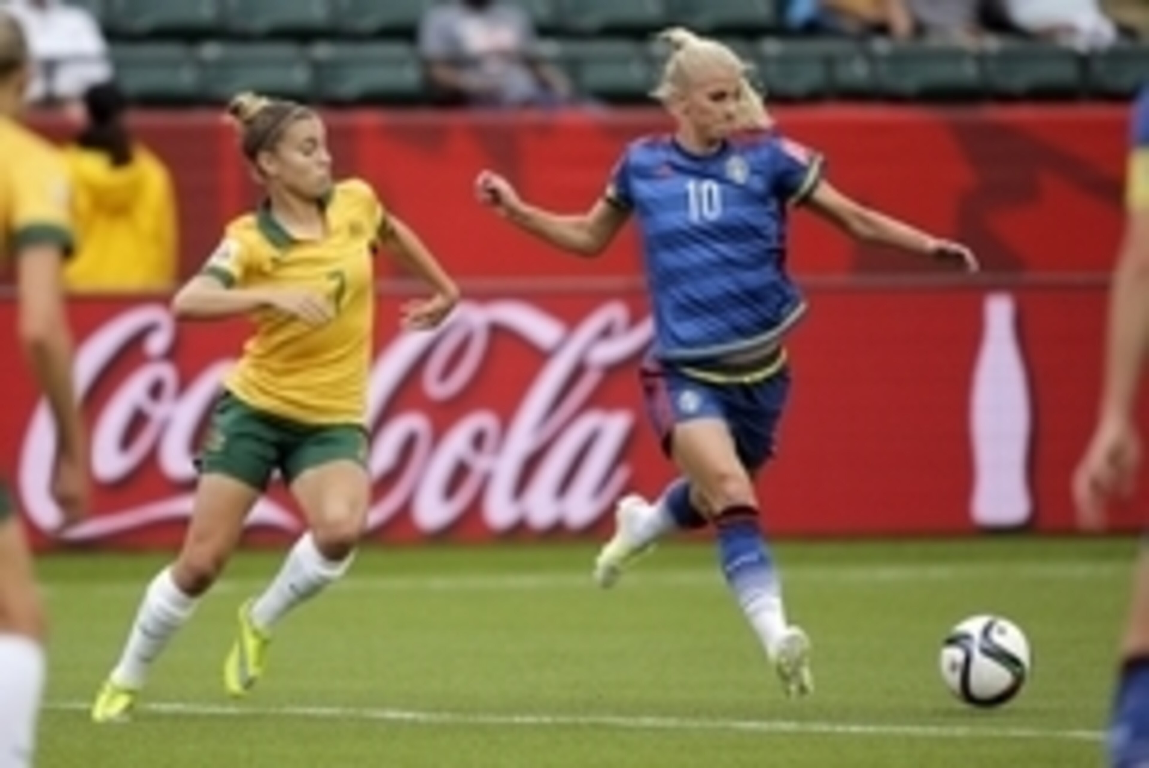 Jun 16, 2015; Edmonton, Alberta, CAN; Sweden forward Sofia Jakobsson (10) scores a goal past Australia defender Steph Catley (7) during the first half in a Group D soccer match in the 2015 FIFA women's World Cup at Commonwealth Stadium. Mandatory Credit: Jun 16, 2015; Edmonton, Alberta, CAN; Sweden forward Sofia Jakobsson (10) scores a goal past Australia defender Steph Catley (7) during the first half in a Group D soccer match in the 2015 FIFA women's World Cup at Commonwealth Stadium. Mandatory Credit: