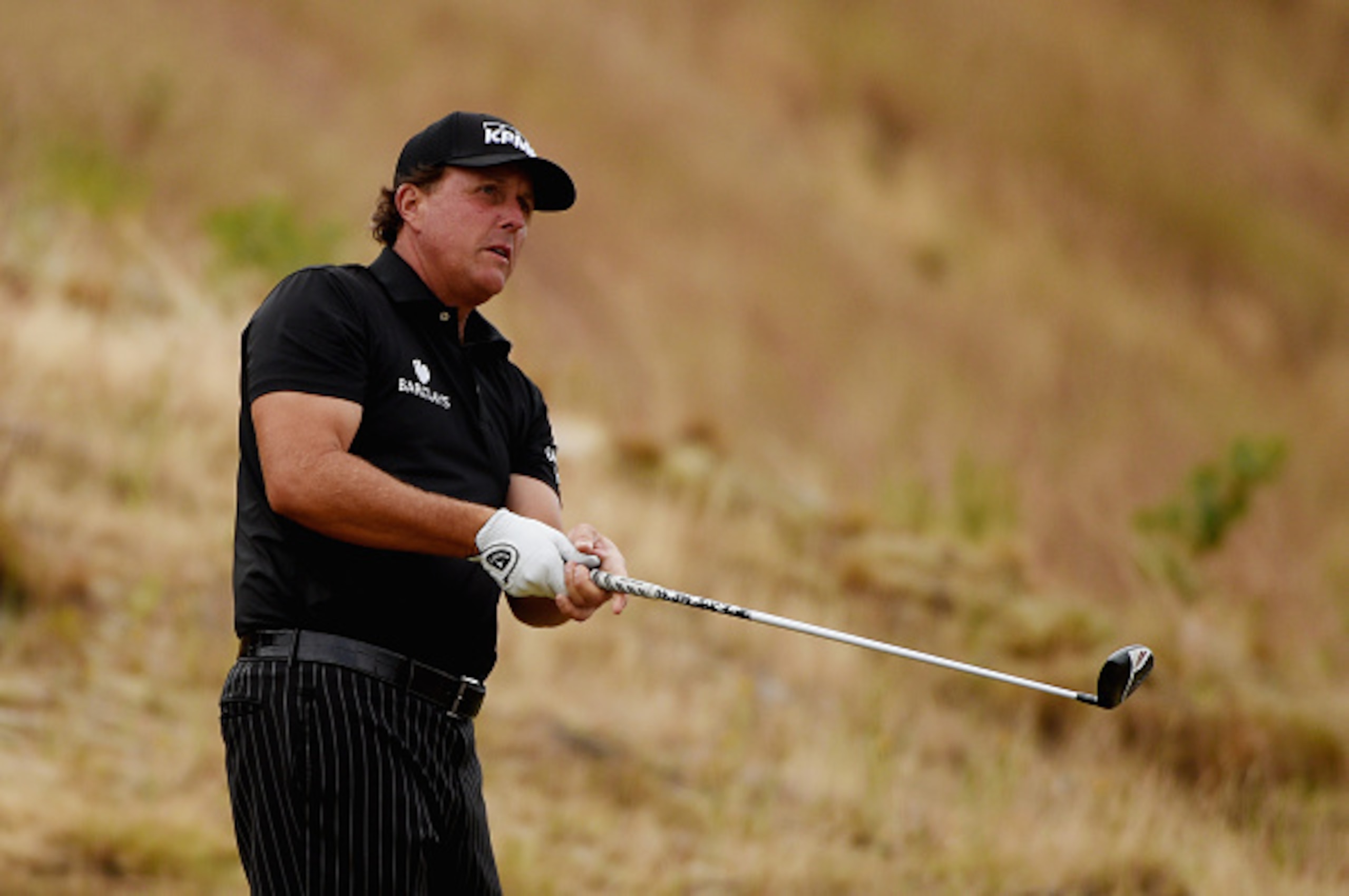 UNIVERSITY PLACE, WA - JUNE 16:  Phil Mickelson of the United States watches a shot during a practice round prior to the start of the 115th U.S. Open Championship at Chambers Bay on June 16, 2015 in University Place, Washington.  (Photo by Ross Kinnaird/G