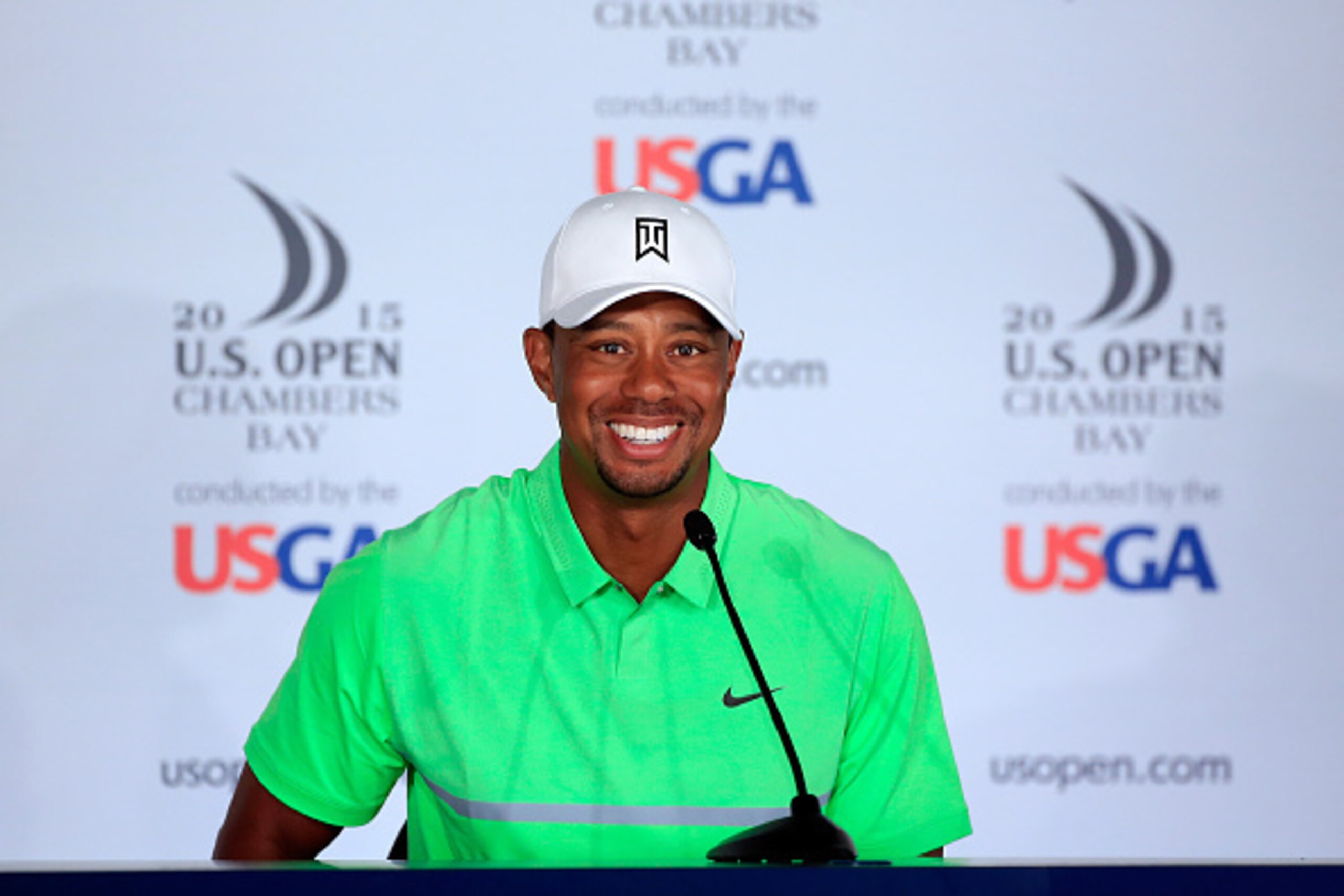 UNIVERSITY PLACE, WA - JUNE 16:  Tiger Woods of the United States talks to the media during a press conference prior to the start of the 115th U.S. Open Championship at Chambers Bay on June 16, 2015 in University Place, Washington.  (Photo by David Cannon