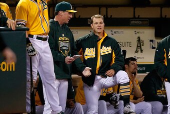 OAKLAND, CA - MAY 29:  Manager Bob Melvin #6 of the Oakland Athletics talks to starting pitcher Sonny Gray #54 in the dugout during the bottom of the eighth inning of their game against the New York Yankees at O.co Coliseum on May 29, 2015 in Oakland, Cal