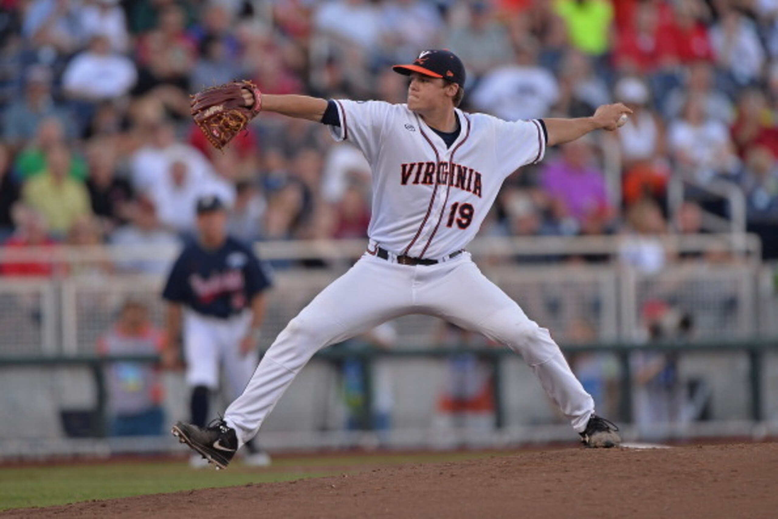 OMAHA, NE - JUNE 23:  Pitcher Nathan Kirby #19 of the Virginia Cavaliers delivers a pitch against the Vanderbilt Commodores in the second inning during game one of the College World Series Championship on June 23, 2014 at TD Ameritrade Park in Omaha, Nebr