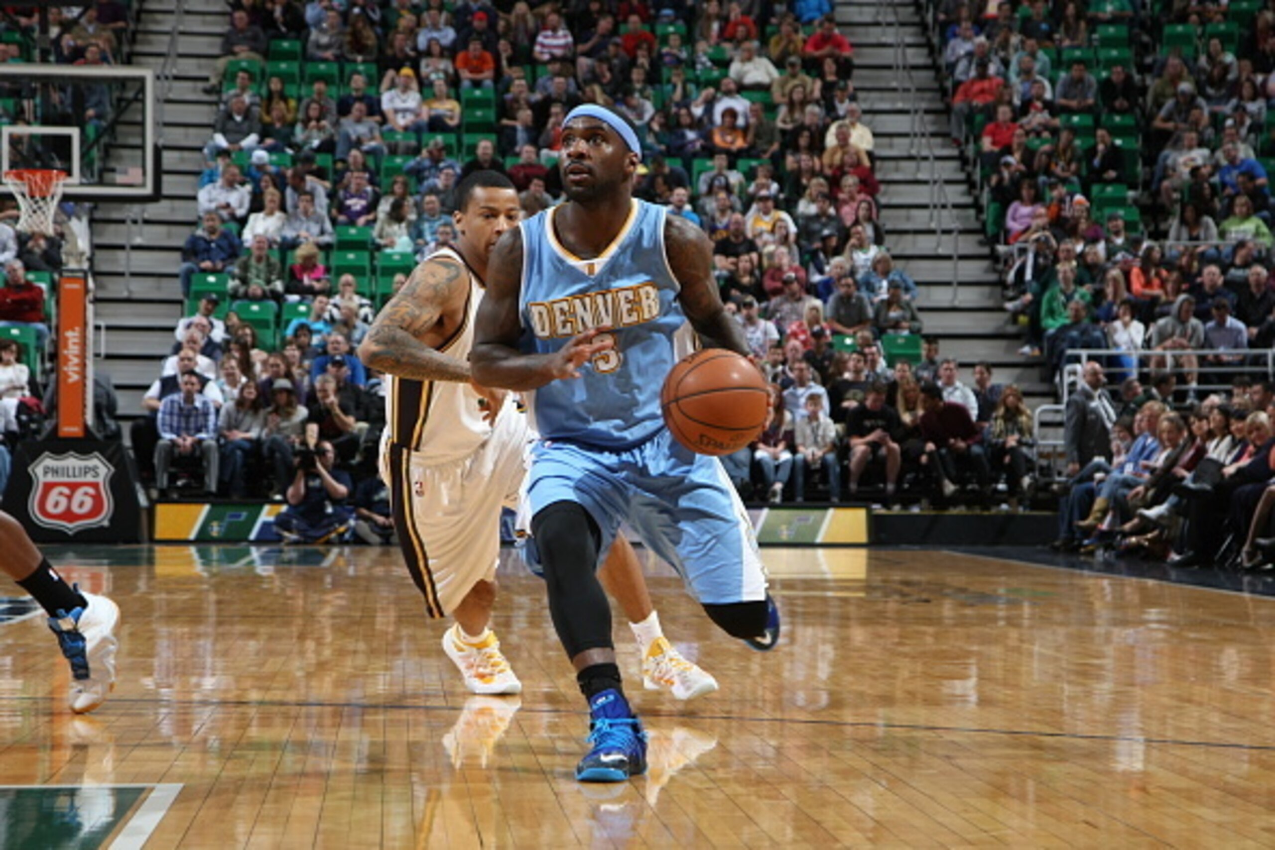 SALT LAKE CITY, UT - APRIL 1:  Ty Lawson #3 of the Denver Nuggets drives to the basket against the Utah Jazz on April 1, 2015 at EnergySolutions Arena in Salt Lake City, Utah. NOTE TO USER: User expressly acknowledges and agrees that, by downloading and o