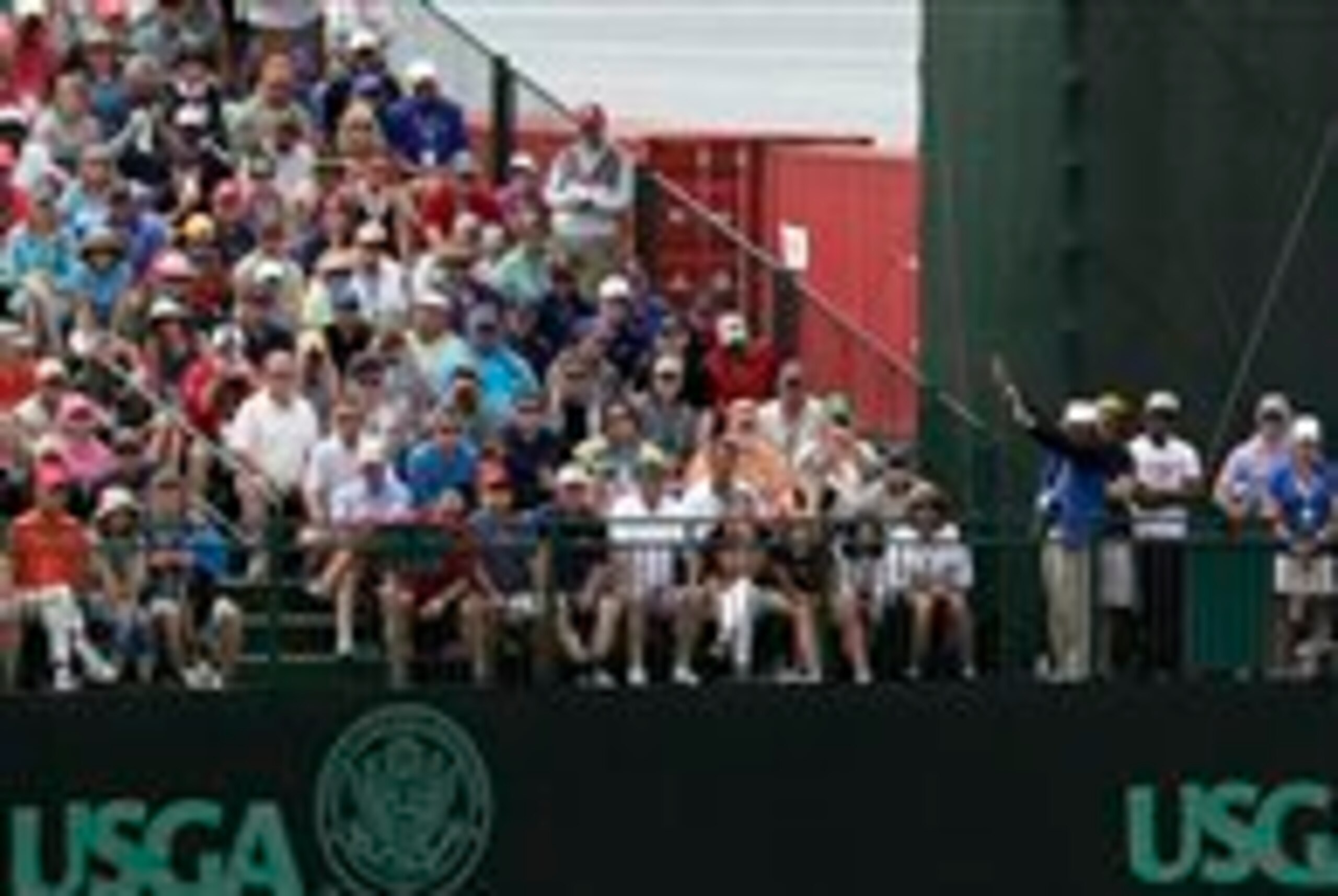 Phil Mickelson putts at the 17th green.