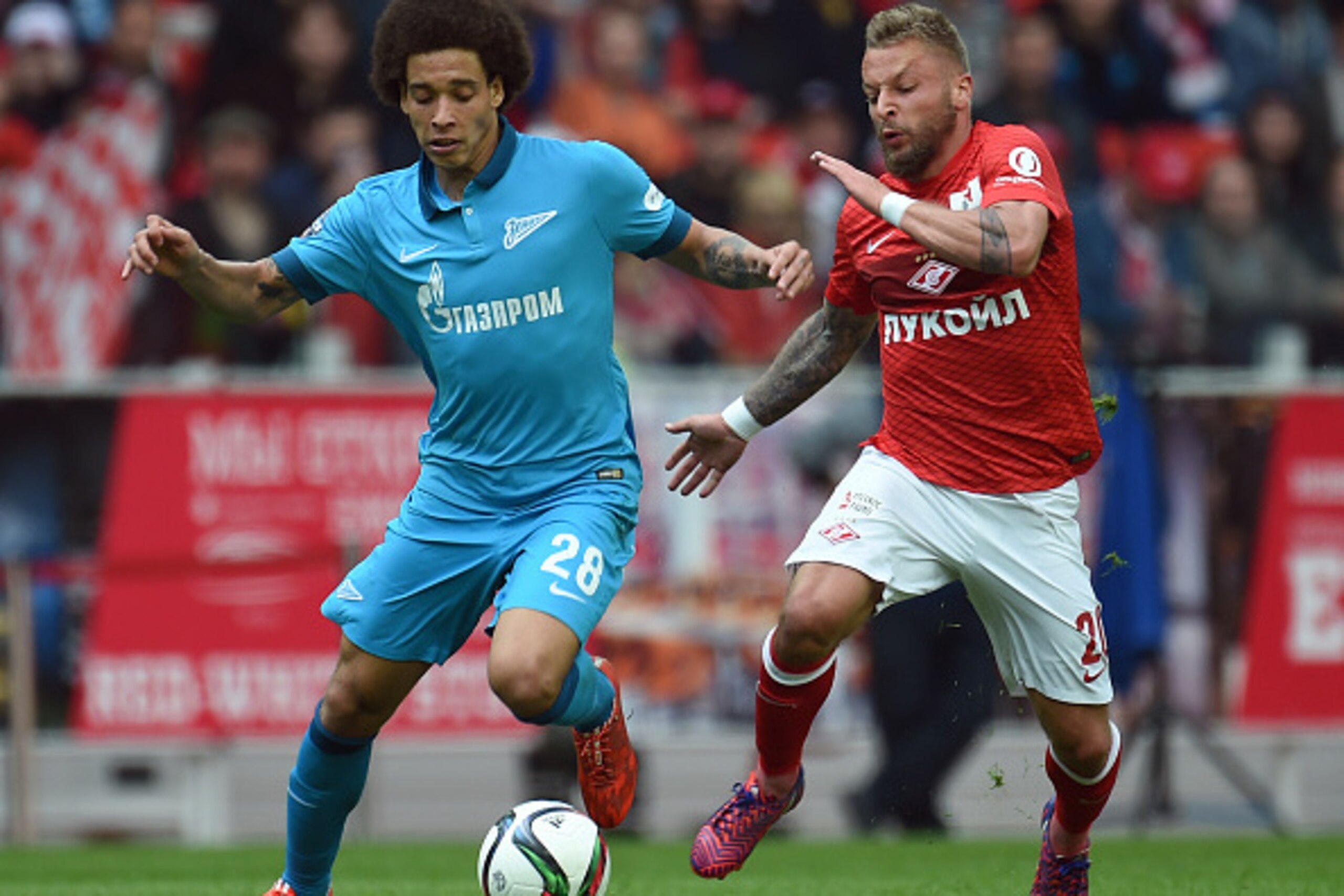 MOSCOW, RUSSIA - MAY 02: Patrick Ebert (R) of FC Spartak Moscow is challenged by Axel Witsel of FC Zenit St Petersburg during the Russian Premier League match between FC Spartak Moscow and FC Zenit St Petersburg at the Arena Otkritie Stadium on May 02, 20 MOSCOW, RUSSIA - MAY 02: Patrick Ebert (R) of FC Spartak Moscow is challenged by Axel Witsel of FC Zenit St Petersburg during the Russian Premier League match between FC Spartak Moscow and FC Zenit St Petersburg at the Arena Otkritie Stadium on May 02, 20
