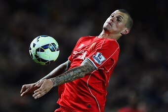 HULL, ENGLAND - APRIL 28:  Martin Skrtel of Liverpool controls the ball during the Barclays Premier League match between Hull City and Liverpool at KC Stadium on April 28, 2015 in Hull, England.  (Photo by Laurence Griffiths/Getty Images)