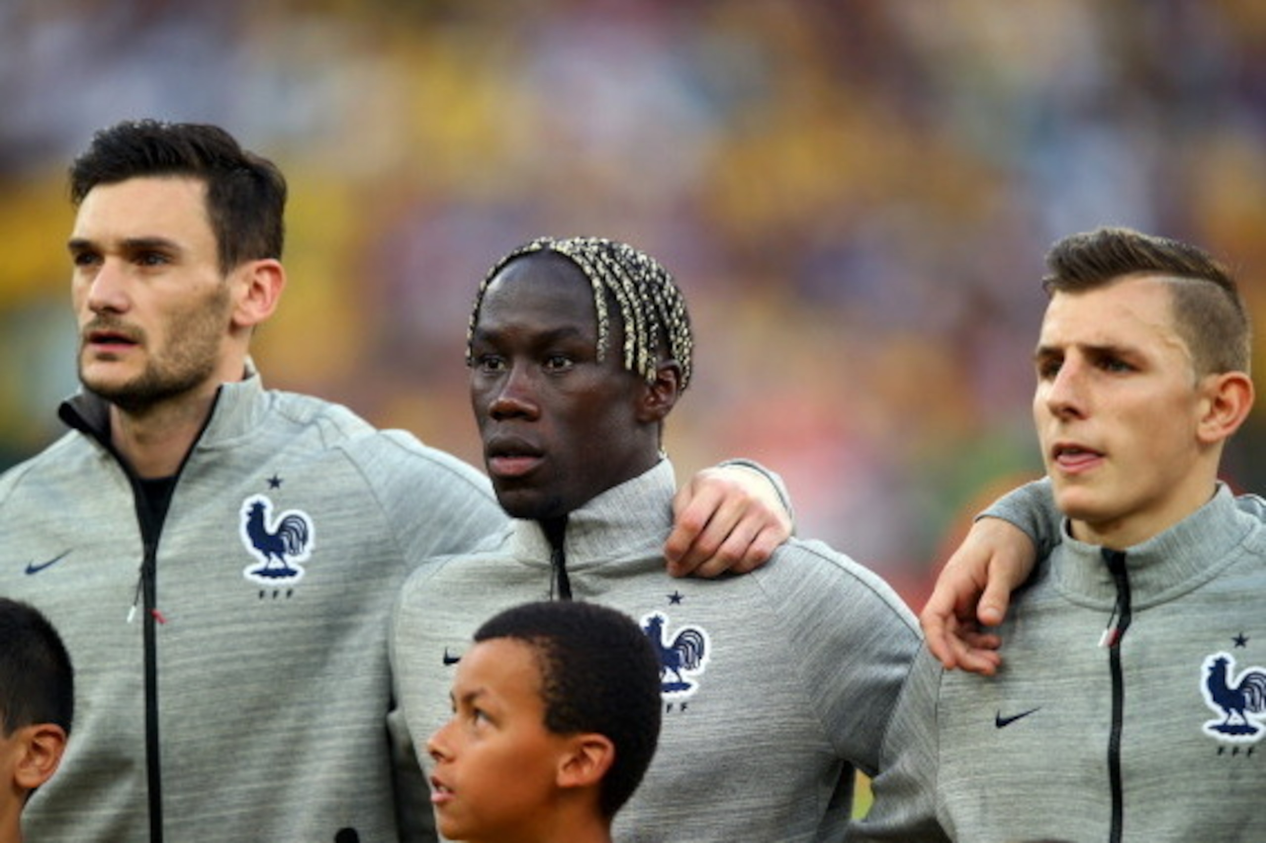 RIO DE JANEIRO, BRAZIL - JUNE 25: (L-R) Hugo Lloris, Bacary Sagna and Lucas Digne of France look on during the National Anthem prior to the 2014 FIFA World Cup Brazil Group E match between Ecuador and France at Maracana on June 25, 2014 in Rio de Janeiro,