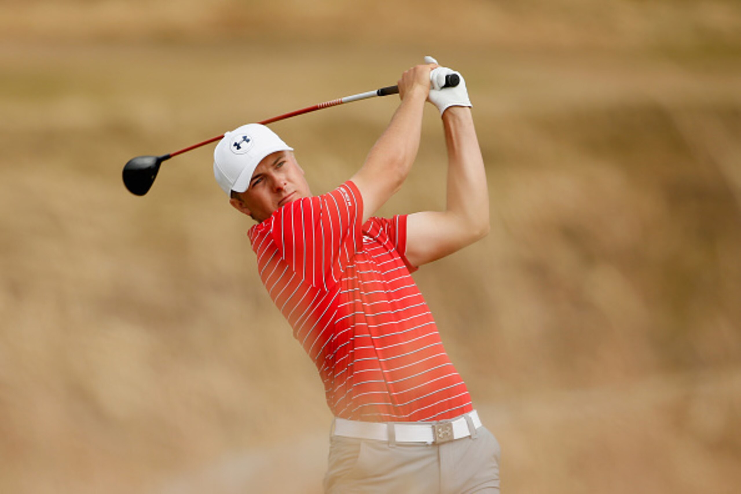 UNIVERSITY PLACE, WA - JUNE 18:  Jordan Spieth of the United States hits his tee shot on the tenth hole during the first round of the 115th U.S. Open Championship at Chambers Bay on June 18, 2015 in University Place, Washington.  (Photo by Ezra Shaw/Getty