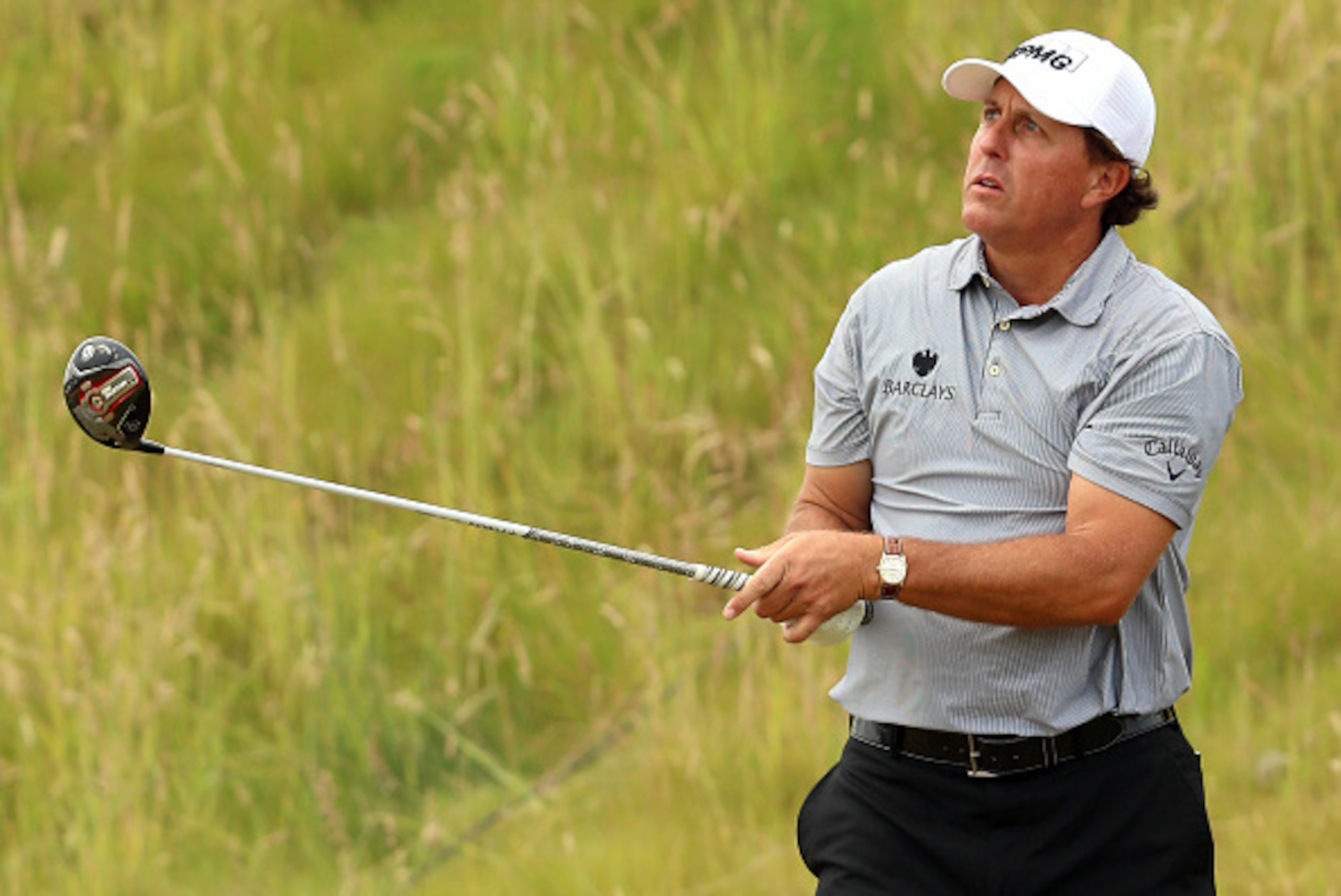 UNIVERSITY PLACE, WA - JUNE 18:  Phil Mickelson of the United States watches his tee shot on the seventh hole during the first round of the 115th U.S. Open Championship at Chambers Bay on June 18, 2015 in University Place, Washington.  (Photo by Andrew Re