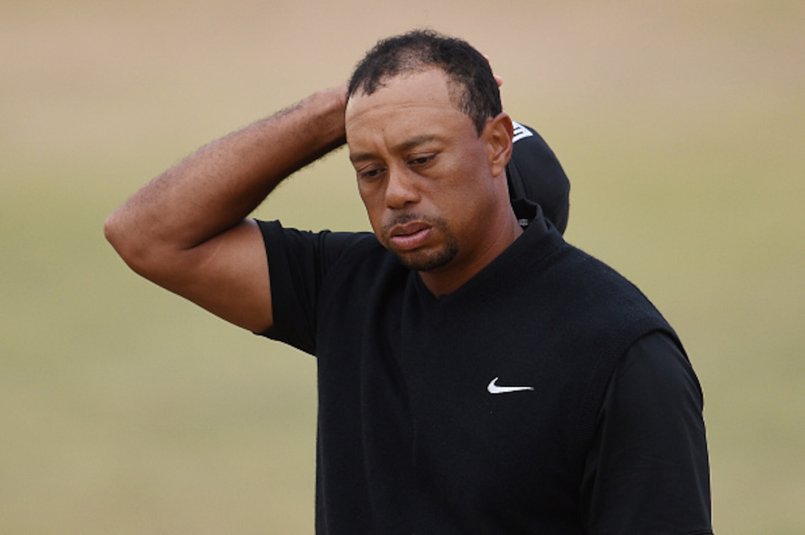 UNIVERSITY PLACE, WA - JUNE 18:  Tiger Woods of the United States reacts on the 18th green during the first round of the 115th U.S. Open Championship at Chambers Bay on June 18, 2015 in University Place, Washington.  (Photo by Ross Kinnaird/Getty Images)