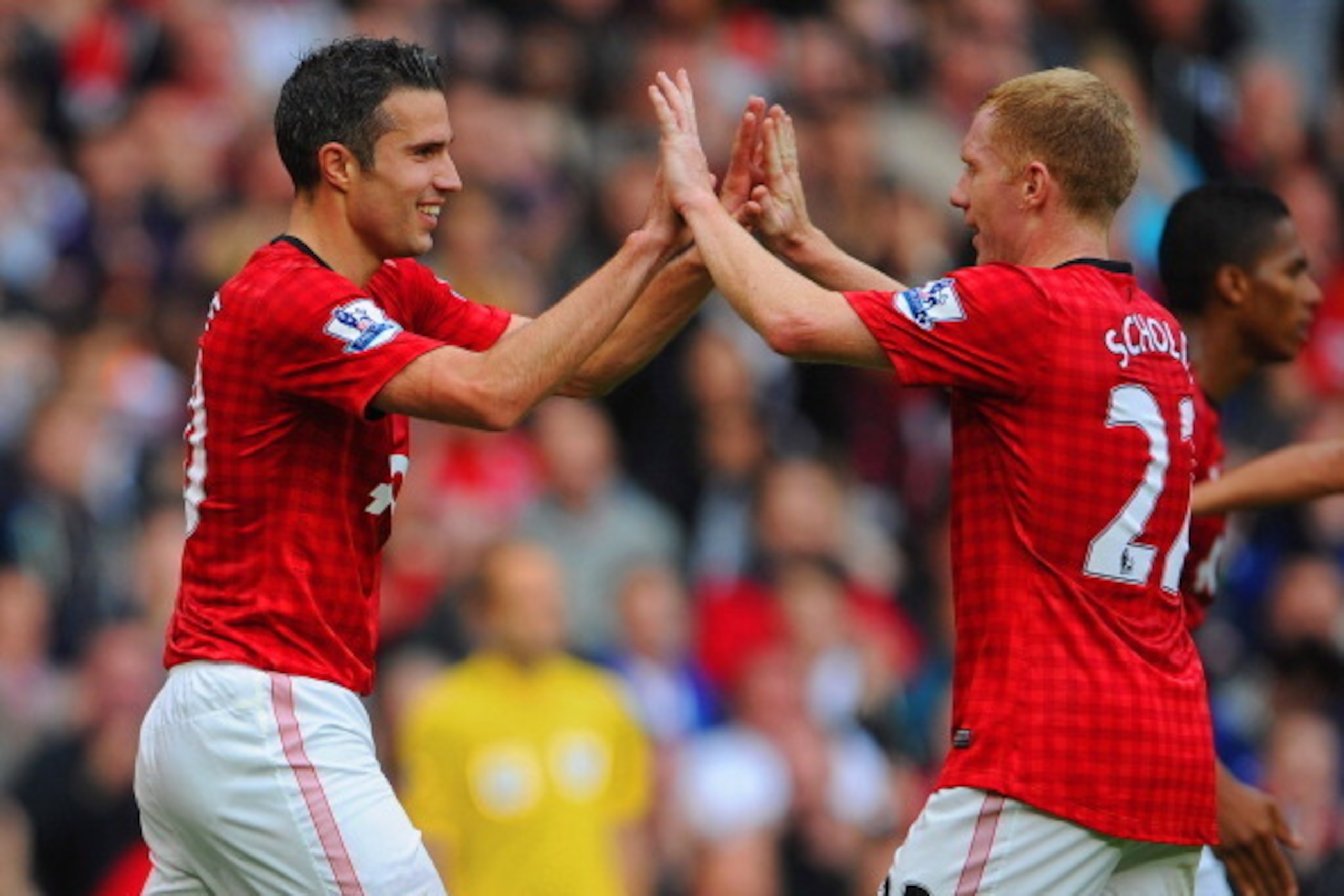 MANCHESTER, ENGLAND - OCTOBER 20: Robin van Persie of manchester United celebrates scoring to make it 2-1 with Paul Scholes during the Barclays Premier League match between Manchester United and Stoke City at Old Trafford on October 20, 2012 in Mancheste MANCHESTER, ENGLAND - OCTOBER 20: Robin van Persie of manchester United celebrates scoring to make it 2-1 with Paul Scholes during the Barclays Premier League match between Manchester United and Stoke City at Old Trafford on October 20, 2012 in Mancheste
