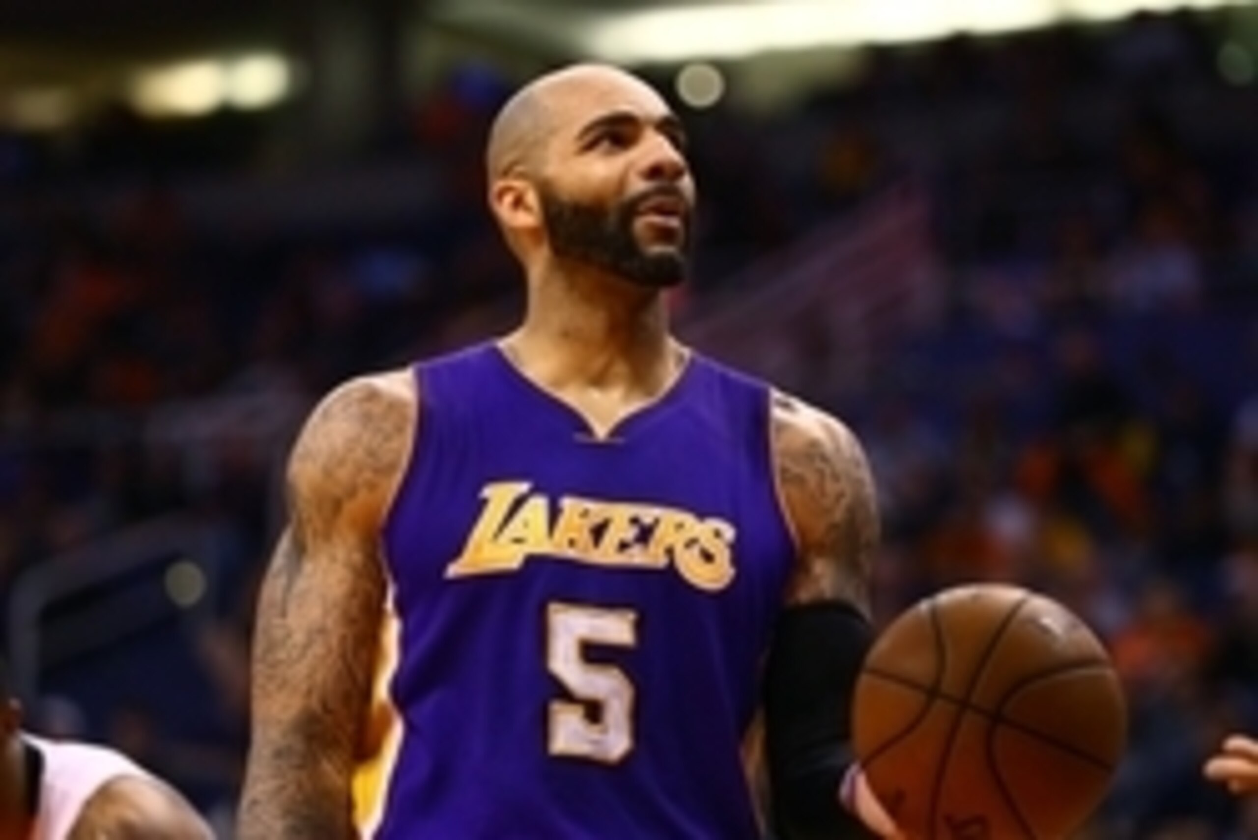 Jan 19, 2015; Phoenix, AZ, USA; Los Angeles Lakers forward Carlos Boozer (5) against the Phoenix Suns at US Airways Center. The Suns defeated the Lakers 115-100. Mandatory Credit: Mark J. Rebilas-USA TODAY Sports