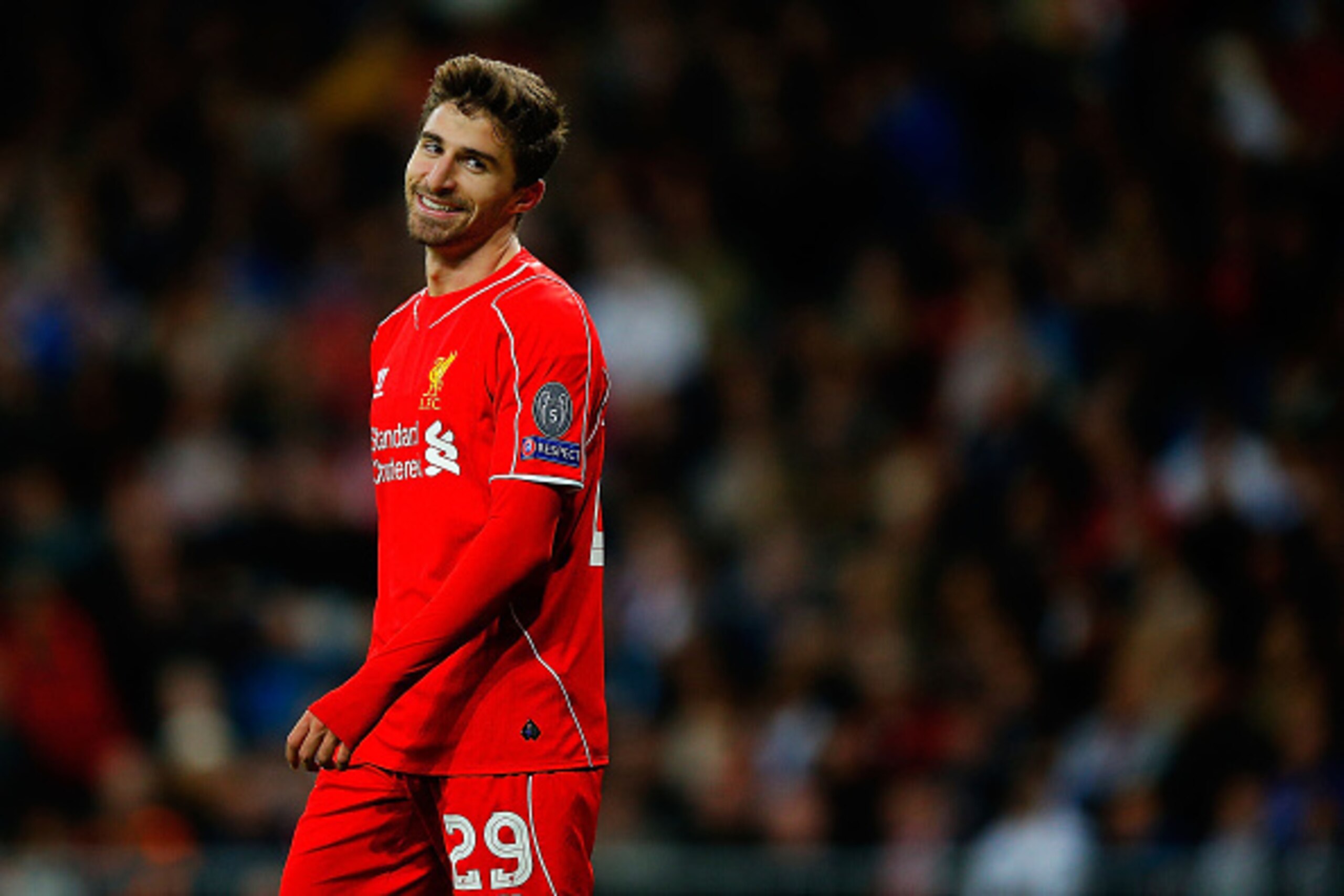 MADRID, SPAIN - NOVEMBER 04: Fabio Borini of Liverpool FC laughs during the UEFA Champions League Group B match between Real Madrid CF and Liverpool FC at Estadio Santiago Bernabeu on November 4, 2014 in Madrid, Spain.  (Photo by Gonzalo Arroyo Moreno/Get
