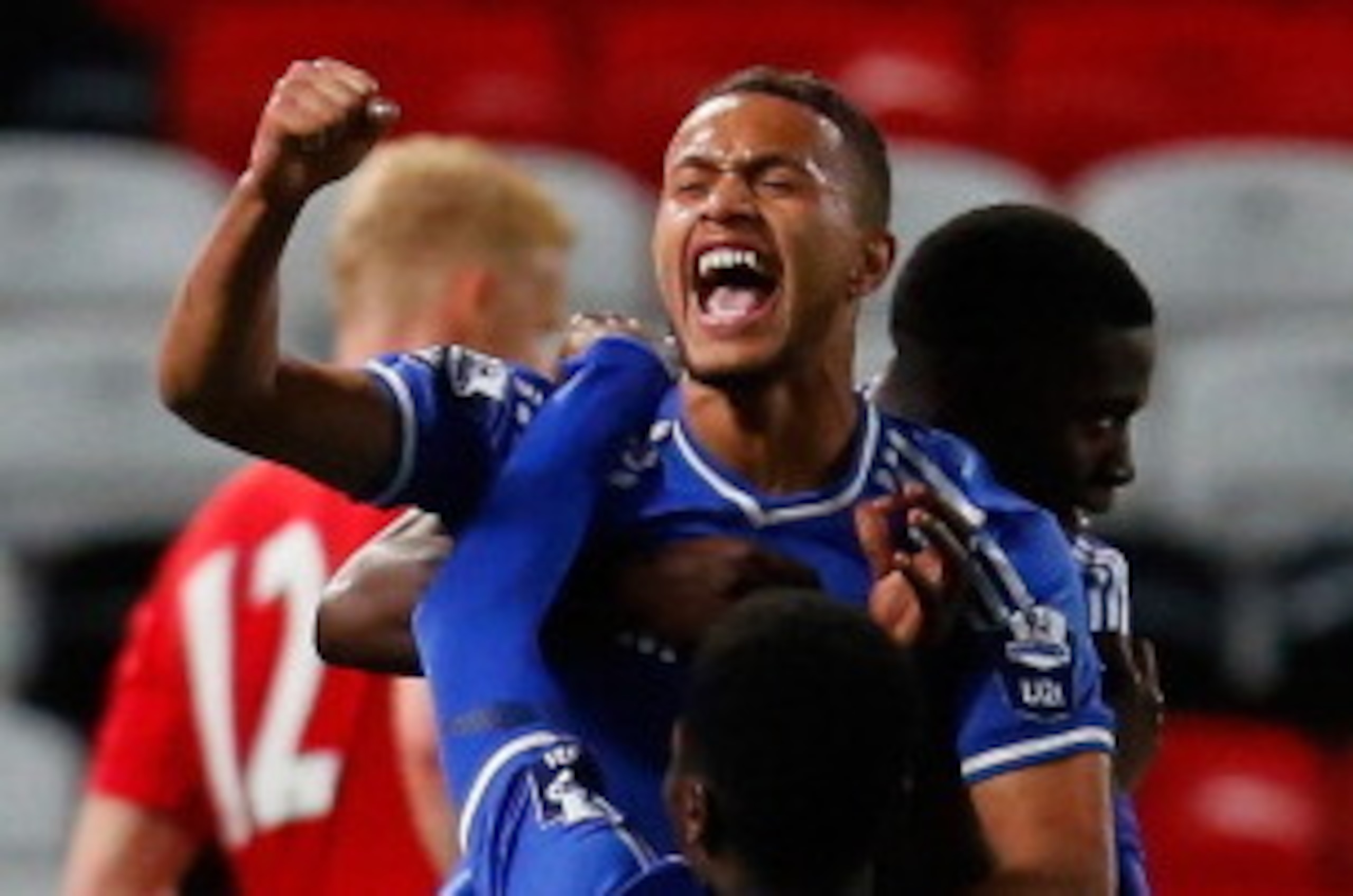 MANCHESTER, ENGLAND - MAY 14: Lewis Baker (L) of Chelsea celebrates at the final whistle with team mates during the Barclays Under-21 Premier League Final match between Manchester United and Chelsea at Old Trafford on May 14, 2014 in Manchester, England. 