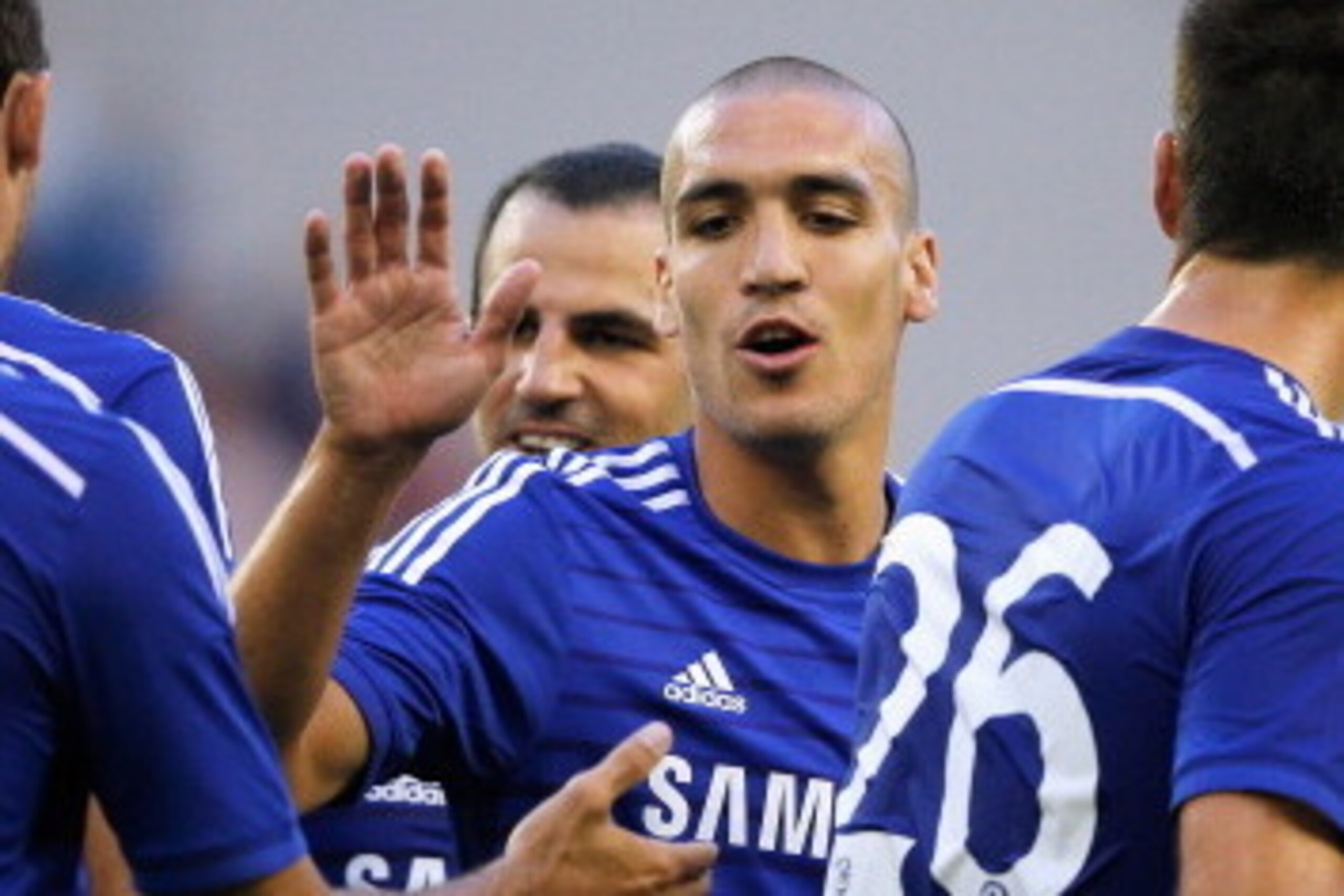 ARNHEM, NETHERLANDS - JULY 30:  Oriol Romeu (C) of Chelsea congratulates goal scorer, Nemanja Matic during the pre season friendly match between Vitesse Arnhem and Chelsea at the Gelredome Stadium on July 30, 2014 in Arnhem, Netherlands.  (Photo by Dean M
