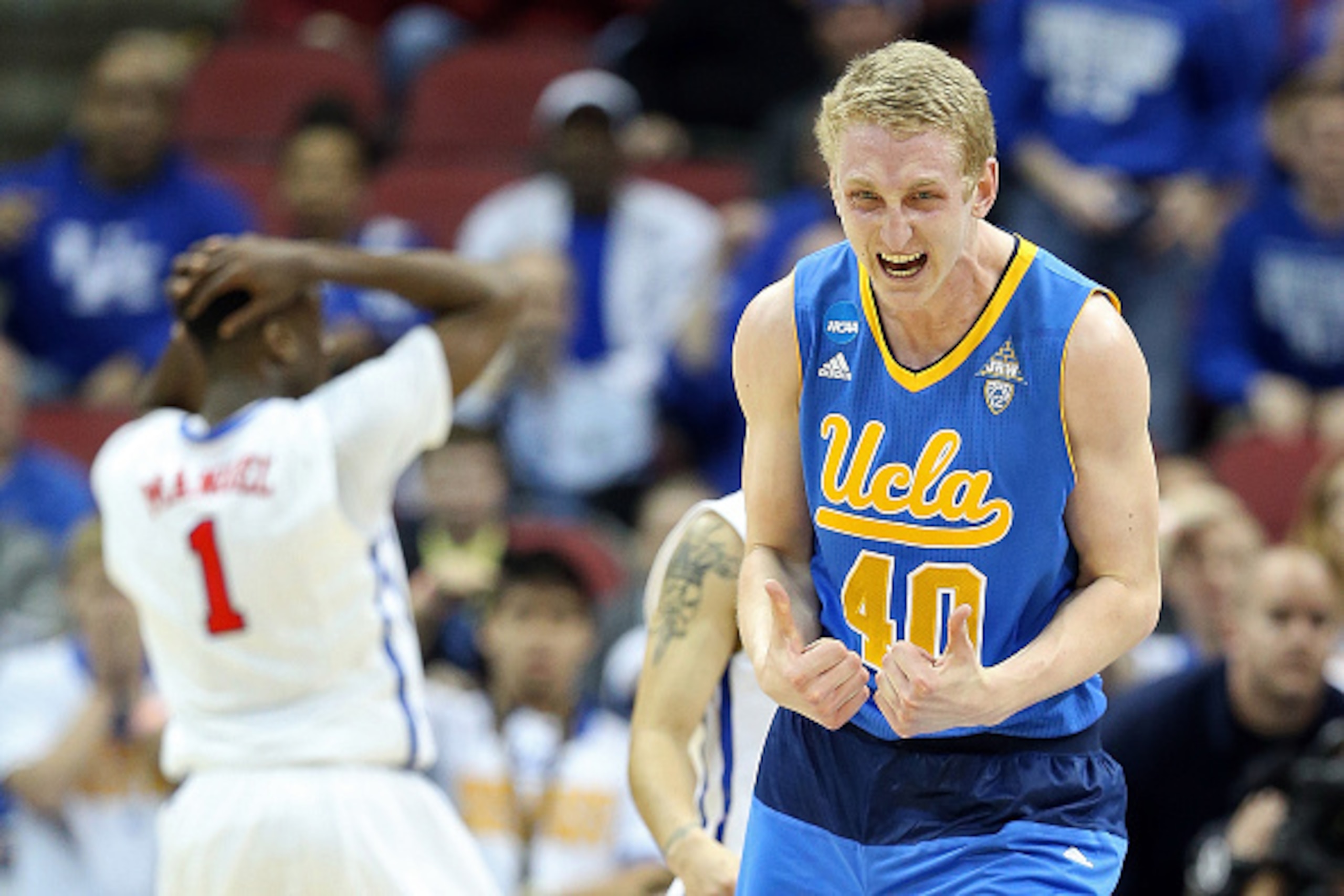 LOUISVILLE, KY - MARCH 19:  Thomas Welsh #40 of the UCLA Bruins reacts towards the end of the game against the Southern Methodist Mustangs during the second round of the 2015 NCAA Men's Basketball Tournamenat at the KFC YUM! Center on March 19, 2015 in Lo