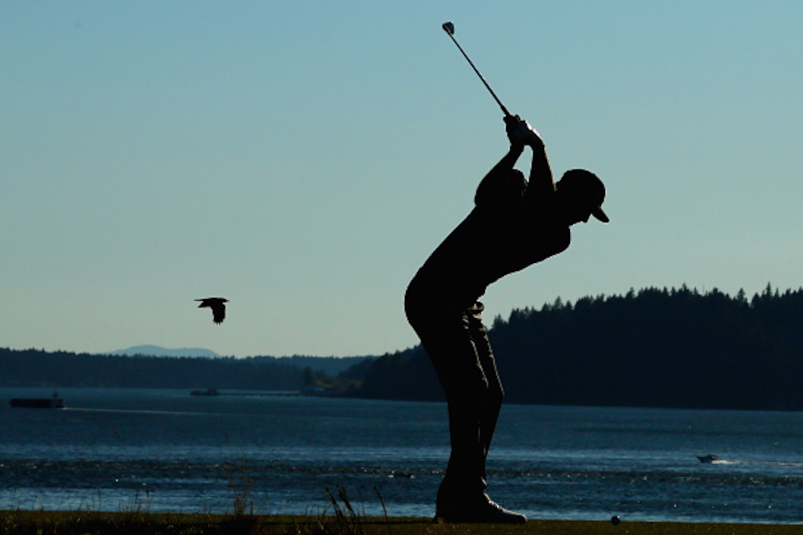 UNIVERSITY PLACE, WA - JUNE 19: Dustin Johnson of the United States hits his tee shot on the 15th hole  during the second round of the 115th U.S. Open Championship at Chambers Bay on June 19, 2015 in University Place, Washington.  (Photo by Mike Ehrmann/G