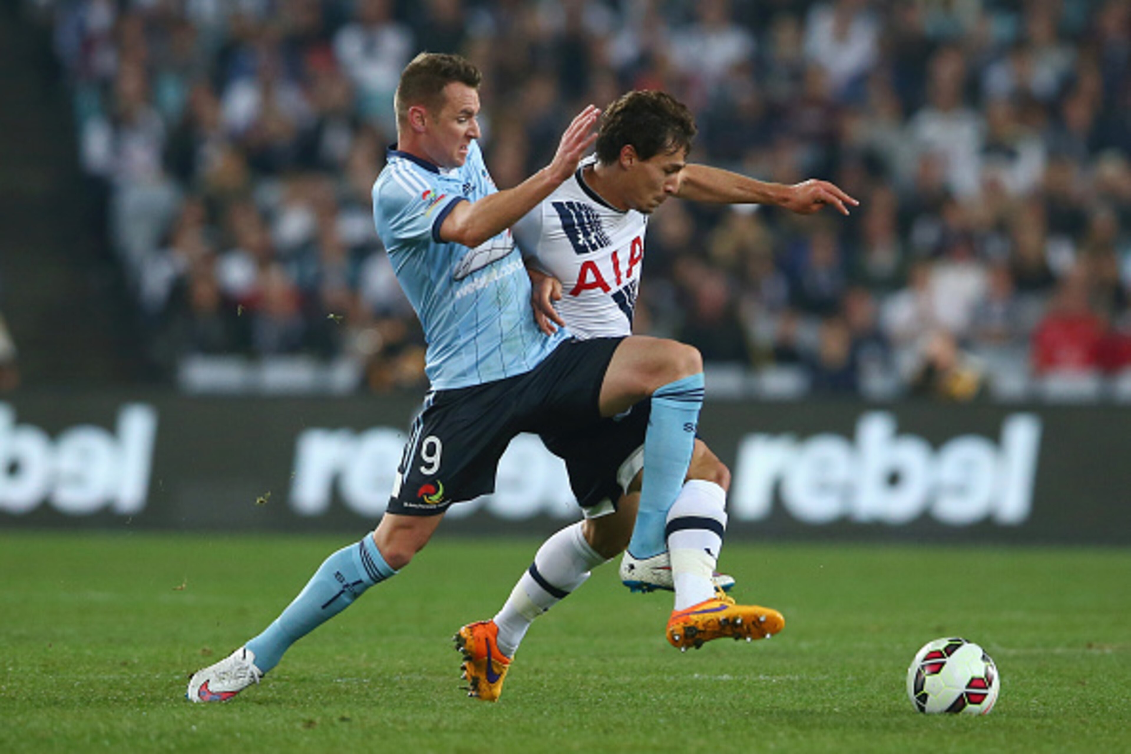 SYDNEY, AUSTRALIA - MAY 30:  Shane Smeltz of Sydney FC and Benjamin Stambouli of Tottenham Hotspur compete for the ball during the international friendly match between Sydney FC and Tottenham Spurs at ANZ Stadium on May 30, 2015 in Sydney, Australia.  (Ph