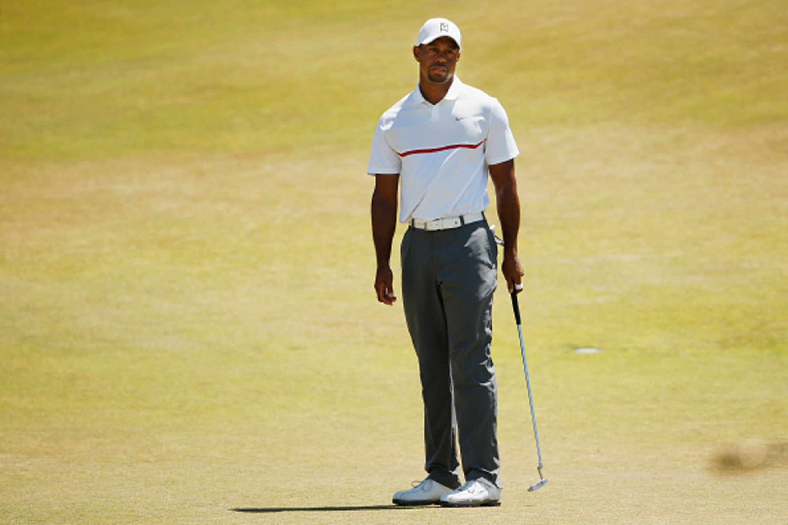 UNIVERSITY PLACE, WA - JUNE 19: Tiger Woods of the United States reacts on the ninth green during the second round of the 115th U.S. Open Championship at Chambers Bay on June 19, 2015 in University Place, Washington. (Photo by Ezra Shaw/Getty Images) UNIVERSITY PLACE, WA - JUNE 19: Tiger Woods of the United States reacts on the ninth green during the second round of the 115th U.S. Open Championship at Chambers Bay on June 19, 2015 in University Place, Washington. (Photo by Ezra Shaw/Getty Images)