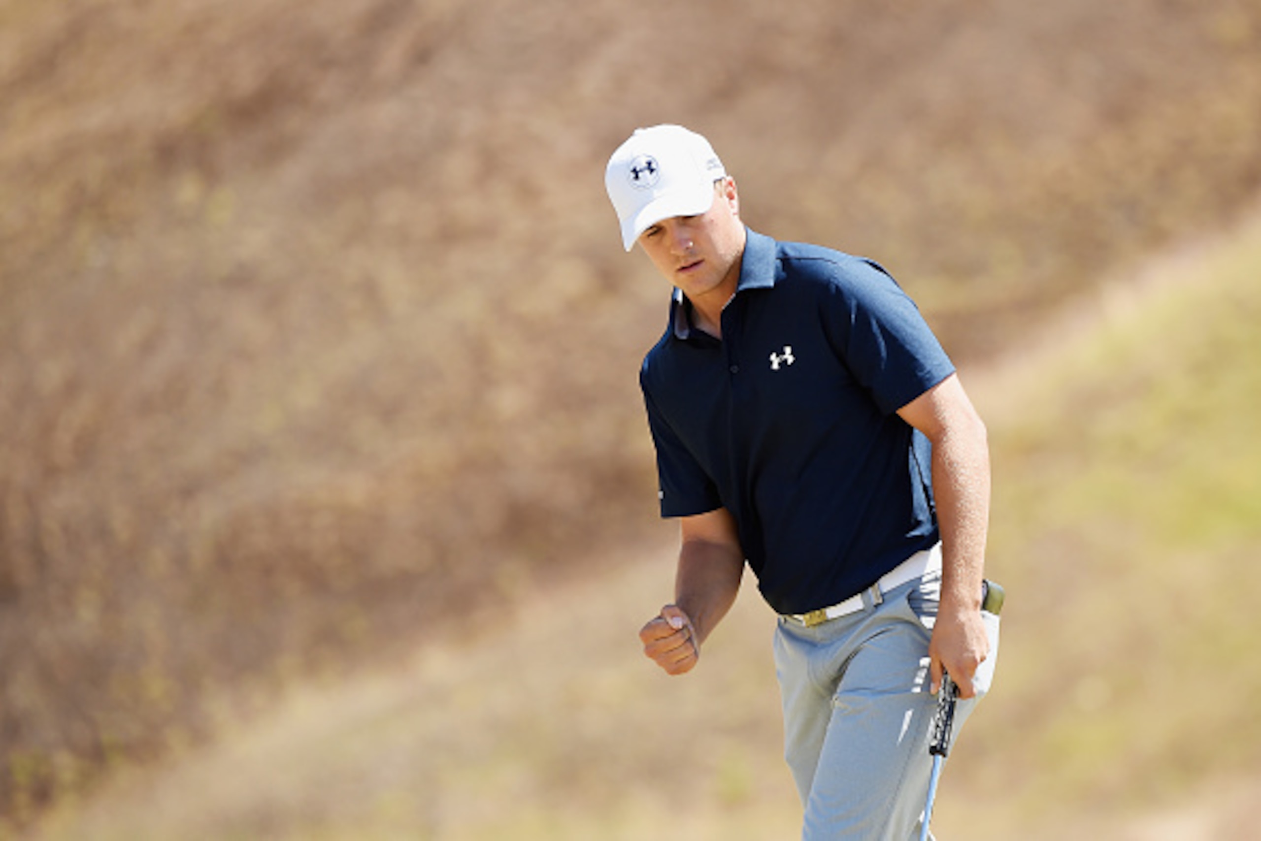 UNIVERSITY PLACE, WA - JUNE 19:  Jordan Spieth of the United States celebrates after a birdie putt on the ninth green during the second round of the 115th U.S. Open Championship at Chambers Bay on June 19, 2015 in University Place, Washington.  (Photo by 