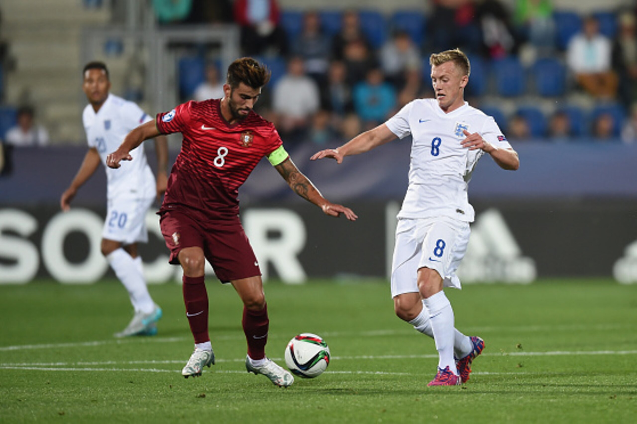 UHERSKE HRADISTE, CZECH REPUBLIC - JUNE 18:  James Ward-Prowse of England in action with Sergio Oliveira of Portugal during the UEFA Under21 European Championship 2015 Group B match between England and Portugal at Mestsky Fotbalovy Stadium on June 18, 201