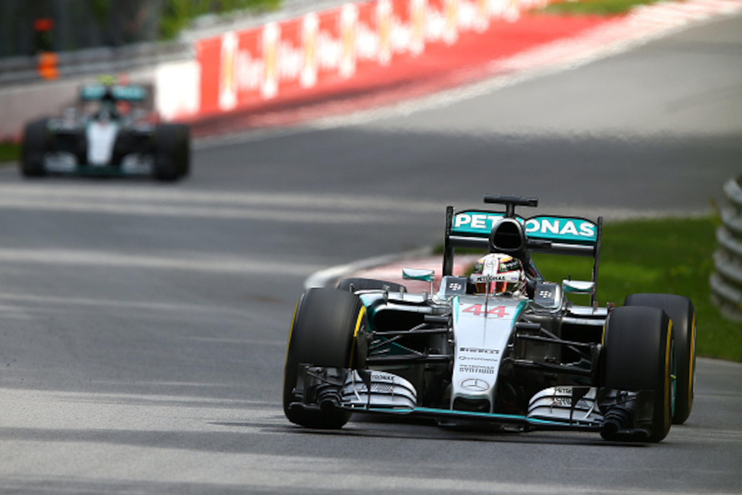 MONTREAL, QC - JUNE 07:  Lewis Hamilton of Great Britain and Mercedes GP leads teammate Nico Rosberg of Germany and Mercedes GP during the Canadian Formula One Grand Prix at Circuit Gilles Villeneuve on June 7, 2015 in Montreal, Canada.  (Photo by Mark Th