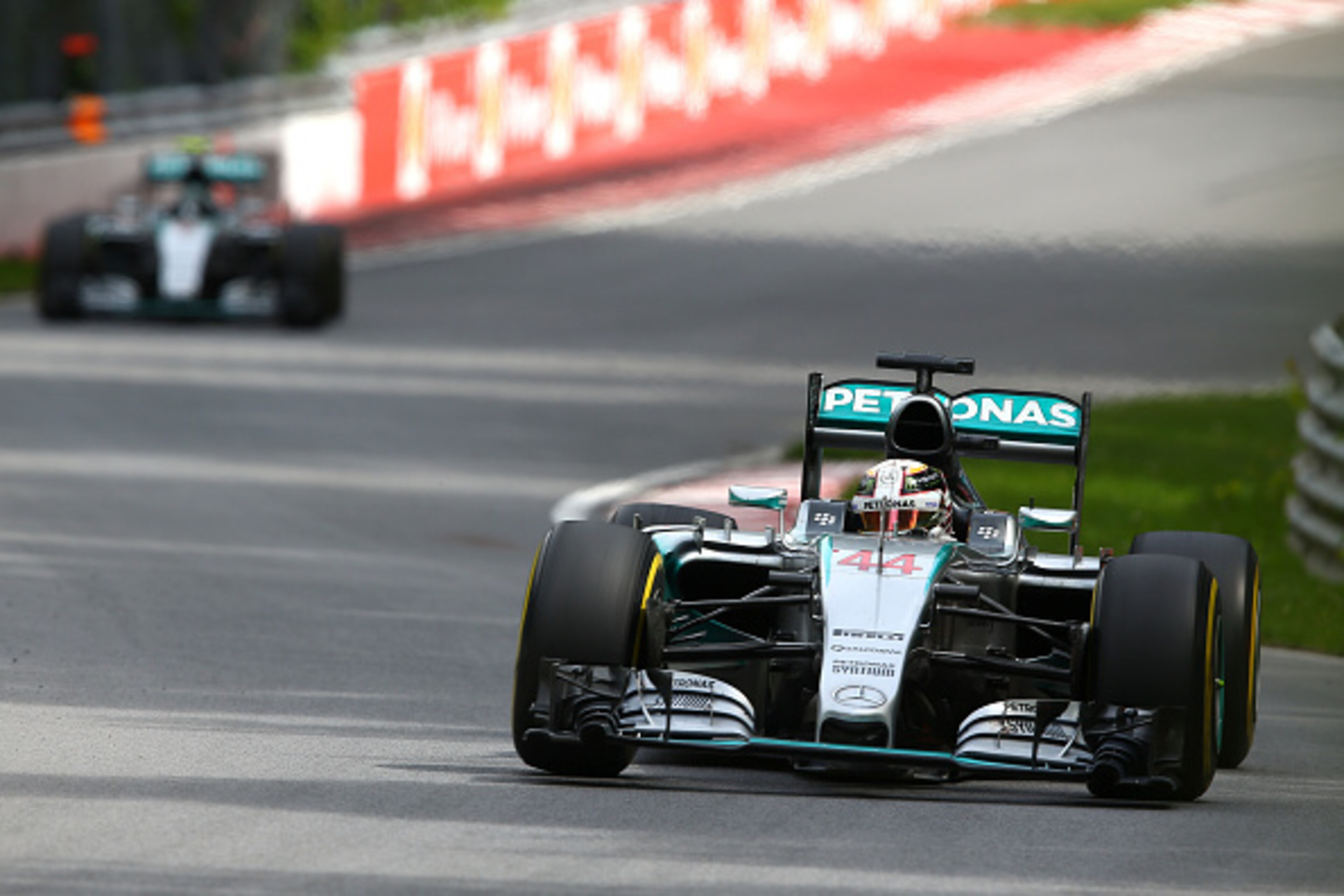 MONTREAL, QC - JUNE 07: Lewis Hamilton of Great Britain and Mercedes GP leads teammate Nico Rosberg of Germany and Mercedes GP during the Canadian Formula One Grand Prix at Circuit Gilles Villeneuve on June 7, 2015 in Montreal, Canada. (Photo by Mark Th MONTREAL, QC - JUNE 07: Lewis Hamilton of Great Britain and Mercedes GP leads teammate Nico Rosberg of Germany and Mercedes GP during the Canadian Formula One Grand Prix at Circuit Gilles Villeneuve on June 7, 2015 in Montreal, Canada. (Photo by Mark Th