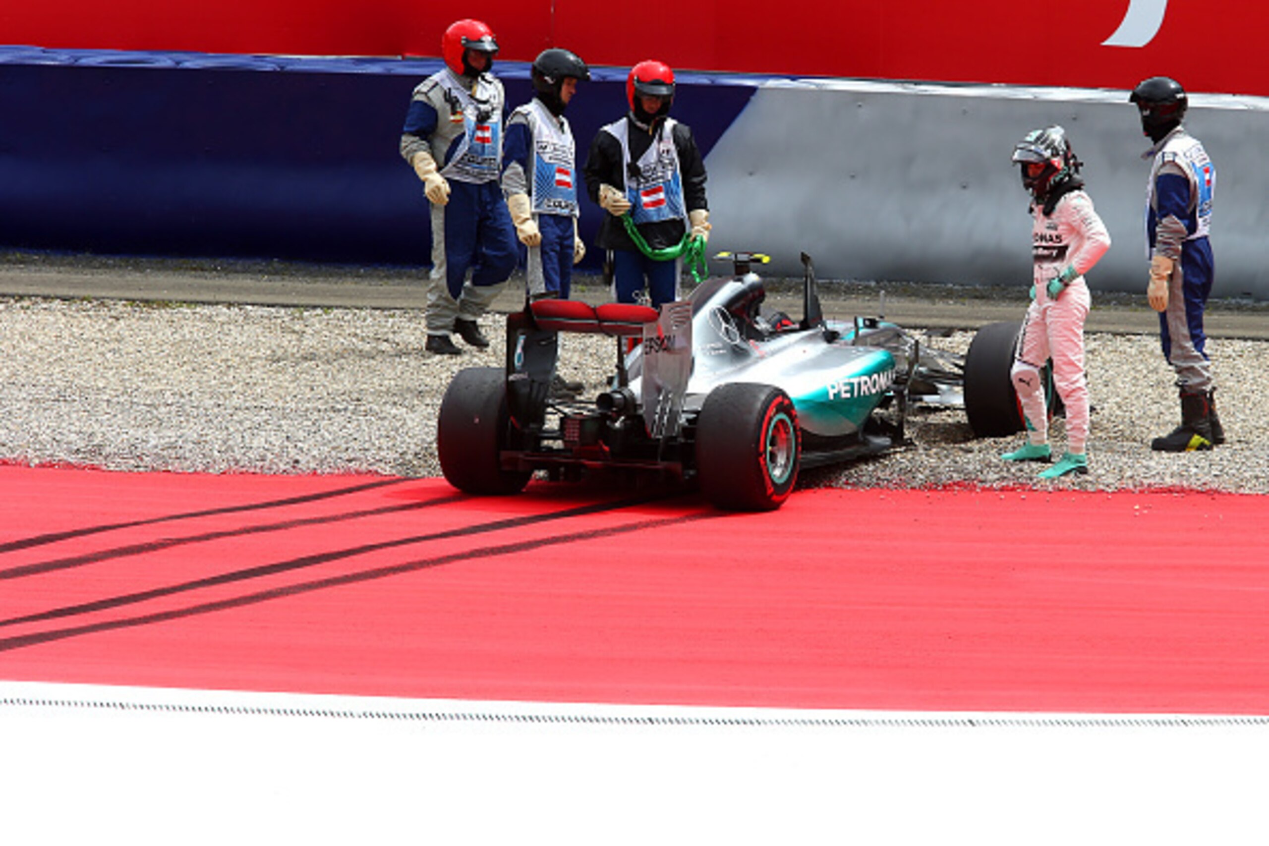 SPIELBERG, AUSTRIA - JUNE 20:  Nico Rosberg of Germany and Mercedes GP gets out of his car after driving off the track during qualifying for the Formula One Grand Prix of Austria at Red Bull Ring on June 20, 2015 in Spielberg, Austria.  (Photo by Mark Tho