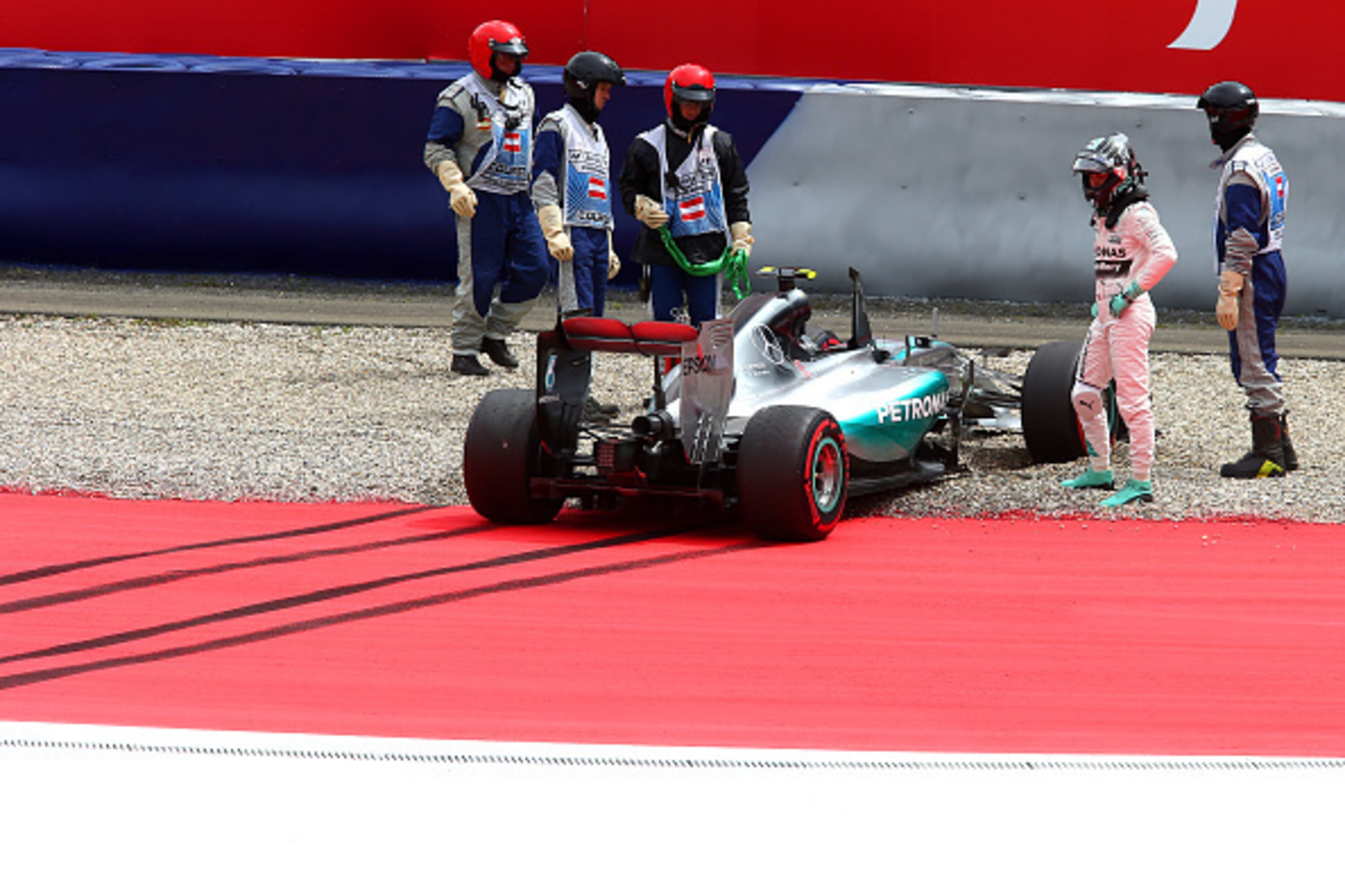 SPIELBERG, AUSTRIA - JUNE 20: Nico Rosberg of Germany and Mercedes GP gets out of his car after driving off the track during qualifying for the Formula One Grand Prix of Austria at Red Bull Ring on June 20, 2015 in Spielberg, Austria. (Photo by Mark Tho SPIELBERG, AUSTRIA - JUNE 20: Nico Rosberg of Germany and Mercedes GP gets out of his car after driving off the track during qualifying for the Formula One Grand Prix of Austria at Red Bull Ring on June 20, 2015 in Spielberg, Austria. (Photo by Mark Tho
