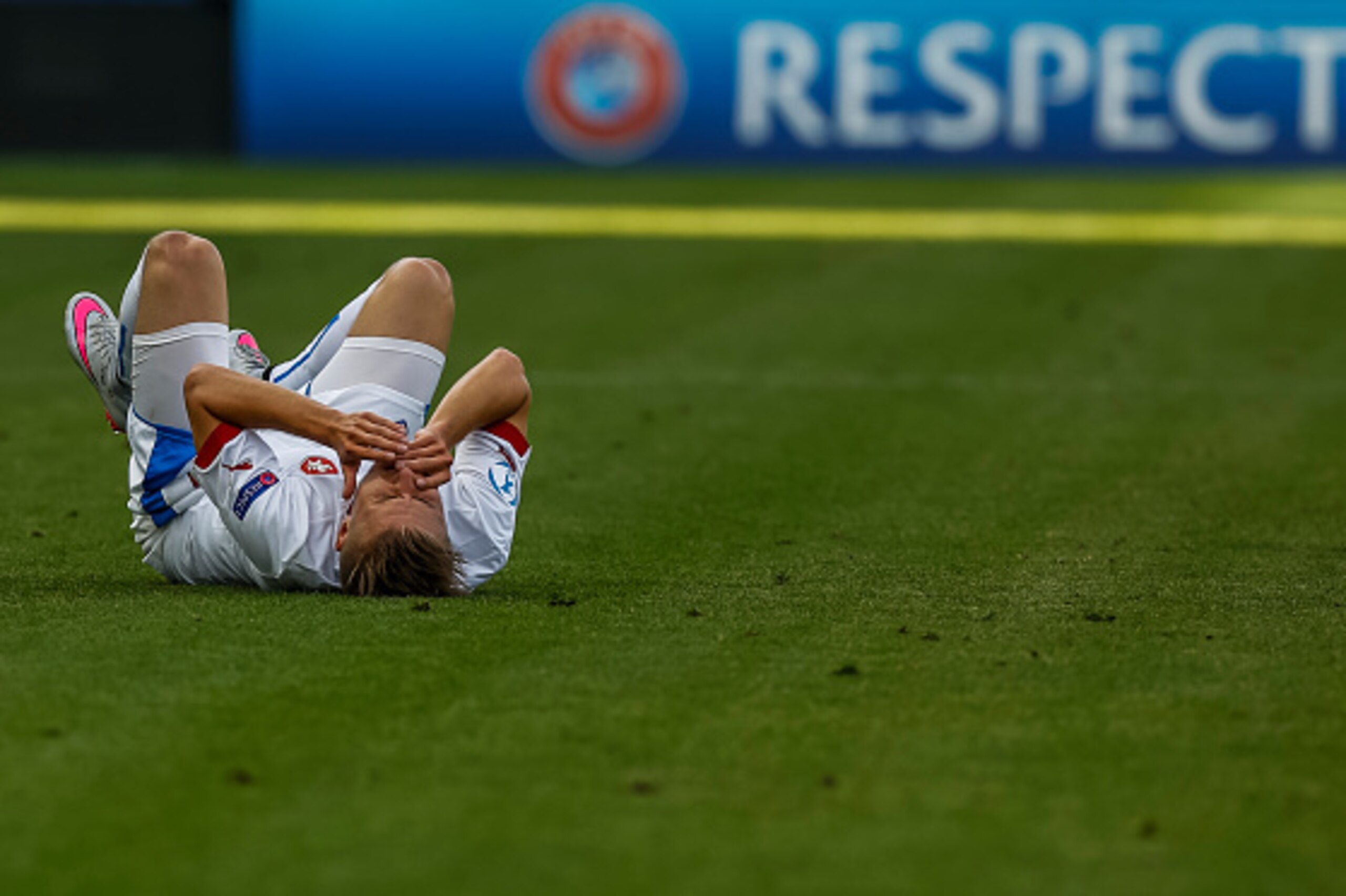 PRAGUE, CZECH REPUBLIC - JUNE 20:  Martin Frydek of Czech Republic lies on the ground during UEFA U21 European Championship Group A match between Serbia and Czech Republic at Letna Stadium on June 20, 2015 in Prague, Czech Republic.  (Photo by Matej Diviz