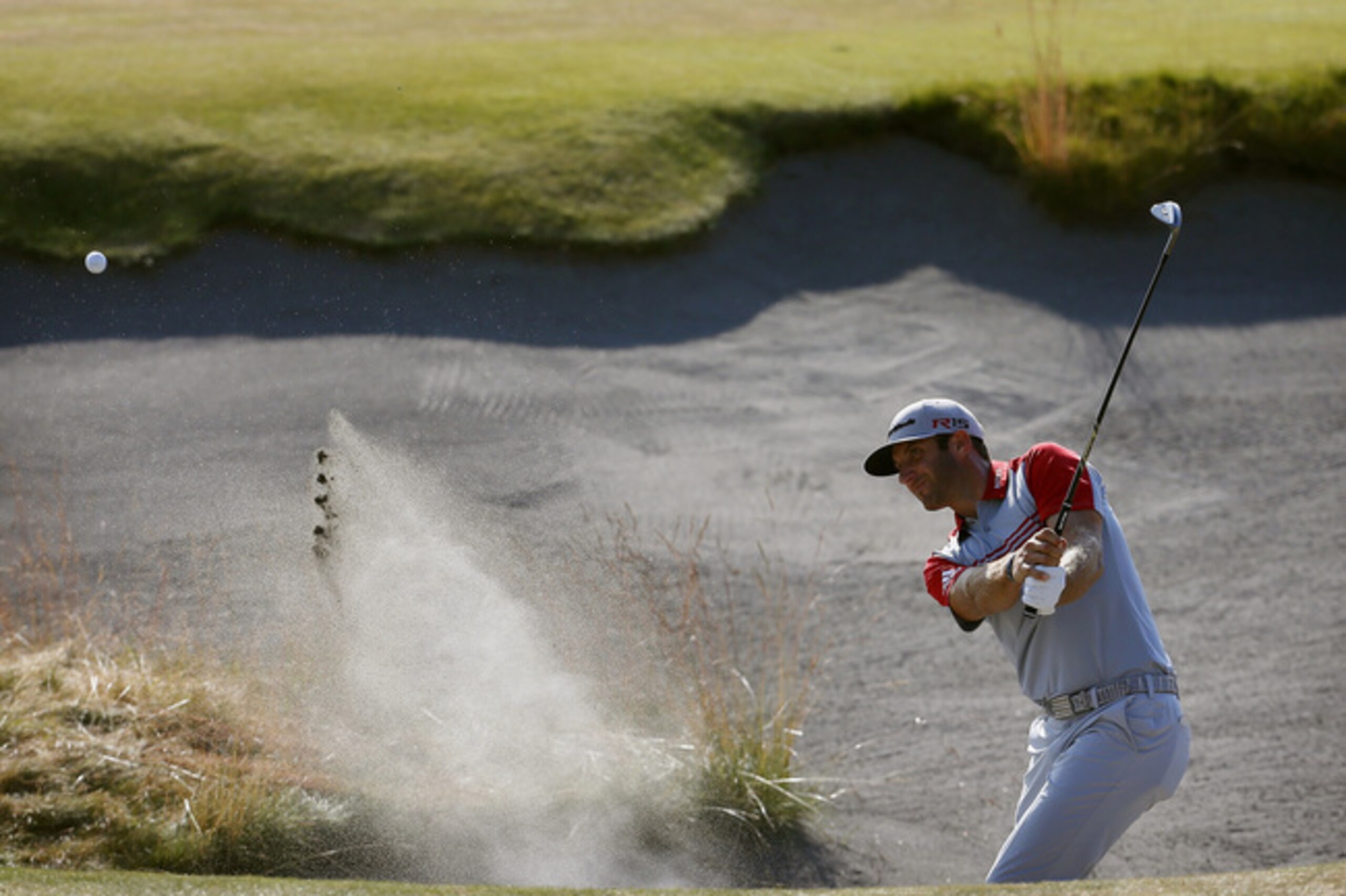 Dustin Johnson never lacks the power needed to escape a bunker.
