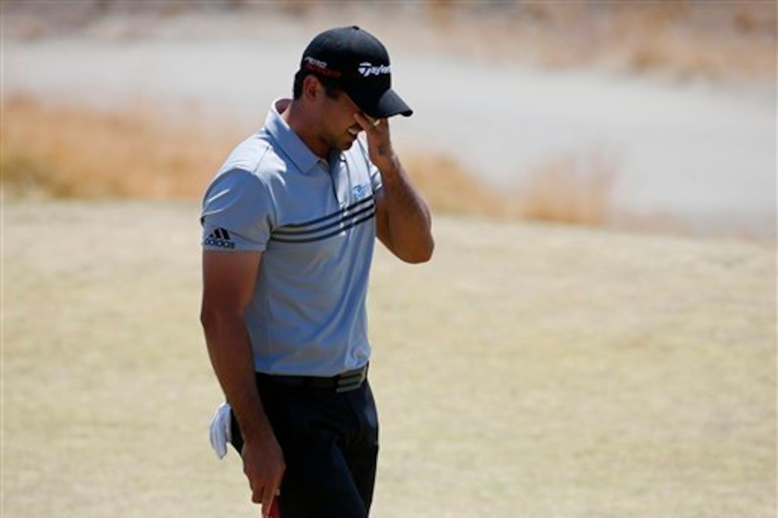 Jason Day looked rocky throughout the third round, but hung in.