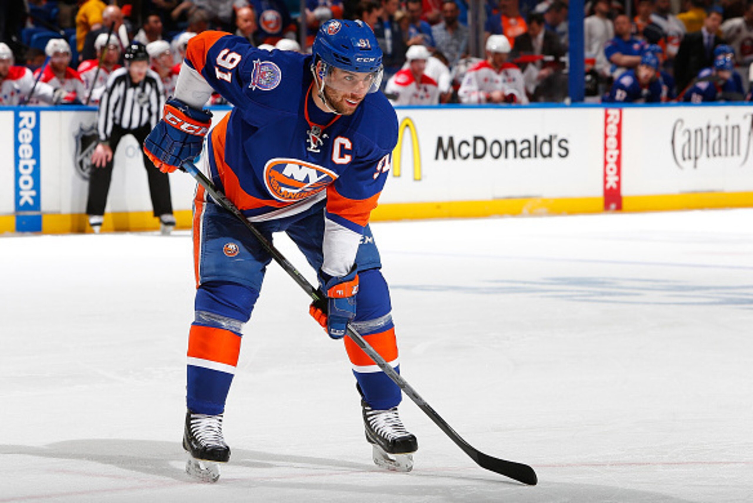 UNIONDALE, NY - APRIL 25: John Tavares #91 of the New York Islanders skates against the Washington Capitals during Game Six of the Eastern Conference Quarterfinals during the 2015 NHL Stanley Cup Playoffs at Nassau Veterans Memorial Coliseum on April 25, 