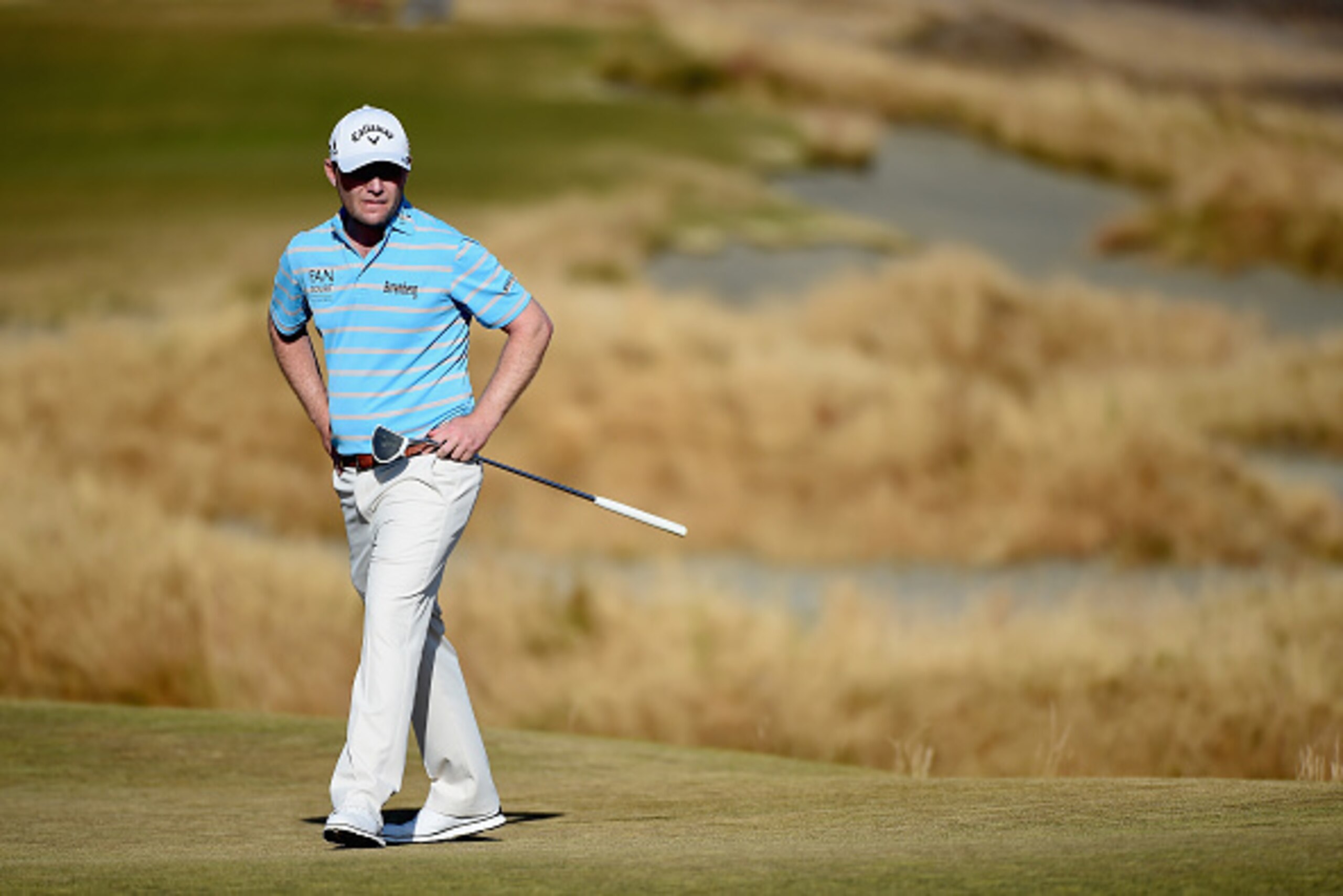 UNIVERSITY PLACE, WA - JUNE 20:  Branden Grace of South Africa looks on from the 14th green during the third round of the 115th U.S. Open Championship at Chambers Bay on June 20, 2015 in University Place, Washington.  (Photo by Harry How/Getty Images)