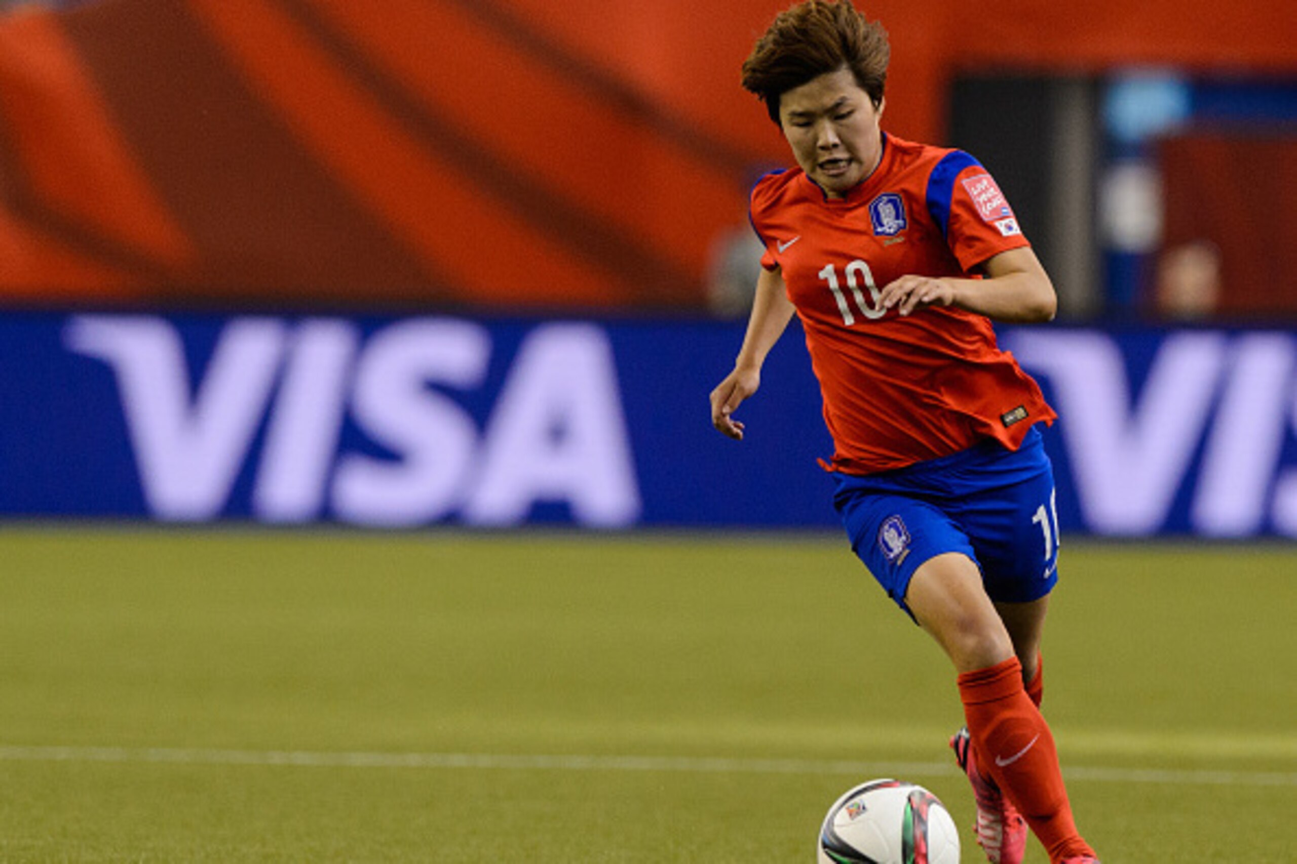 MONTREAL, QC - JUNE 13:  Ji Soyun #10 of Korea Republic moves the ball during the 2015 FIFA Women's World Cup Group E match against Costa Rica at Olympic Stadium on June 13, 2015 in Montreal, Quebec, Canada.  Final score between Korea Republic and Costa R