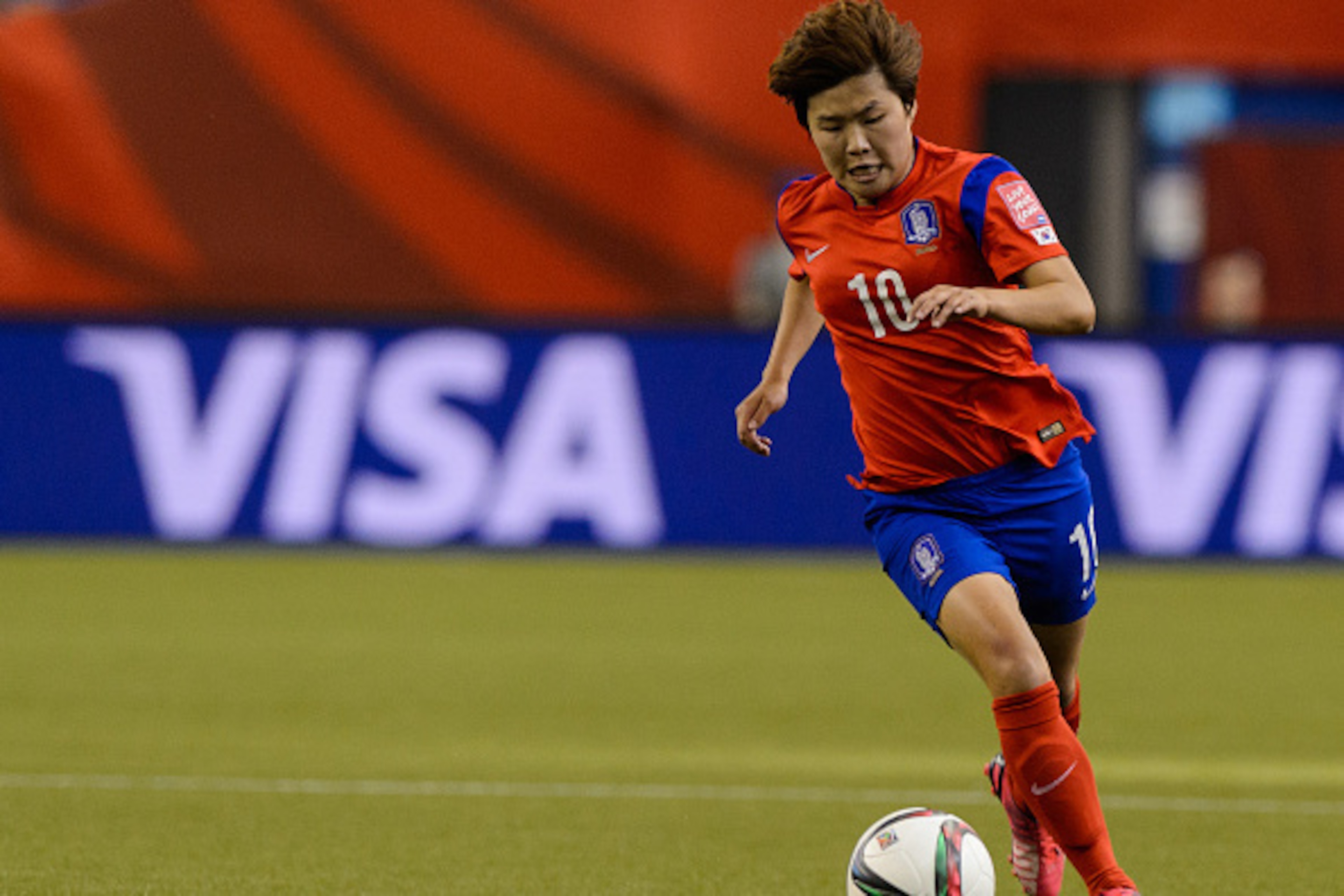 MONTREAL, QC - JUNE 13:  Ji Soyun #10 of Korea Republic moves the ball during the 2015 FIFA Women's World Cup Group E match against Costa Rica at Olympic Stadium on June 13, 2015 in Montreal, Quebec, Canada.  Final score between Korea Republic and Costa R