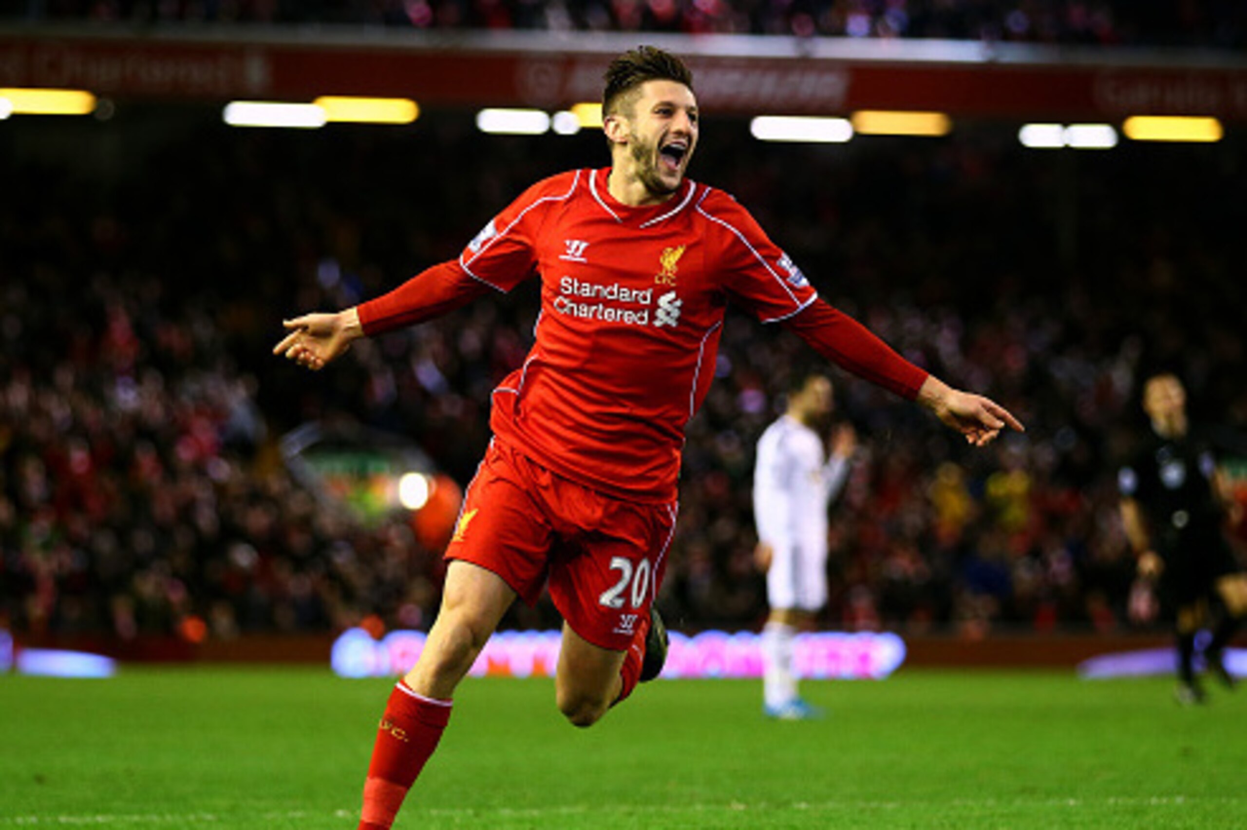 LIVERPOOL, ENGLAND - DECEMBER 29:  Adam Lallana of Liverpool celebrates after scoring his team's second goal during the Barclays Premier League match between Liverpool and Swansea City at Anfield on December 29, 2014 in Liverpool, England.  (Photo by Cliv