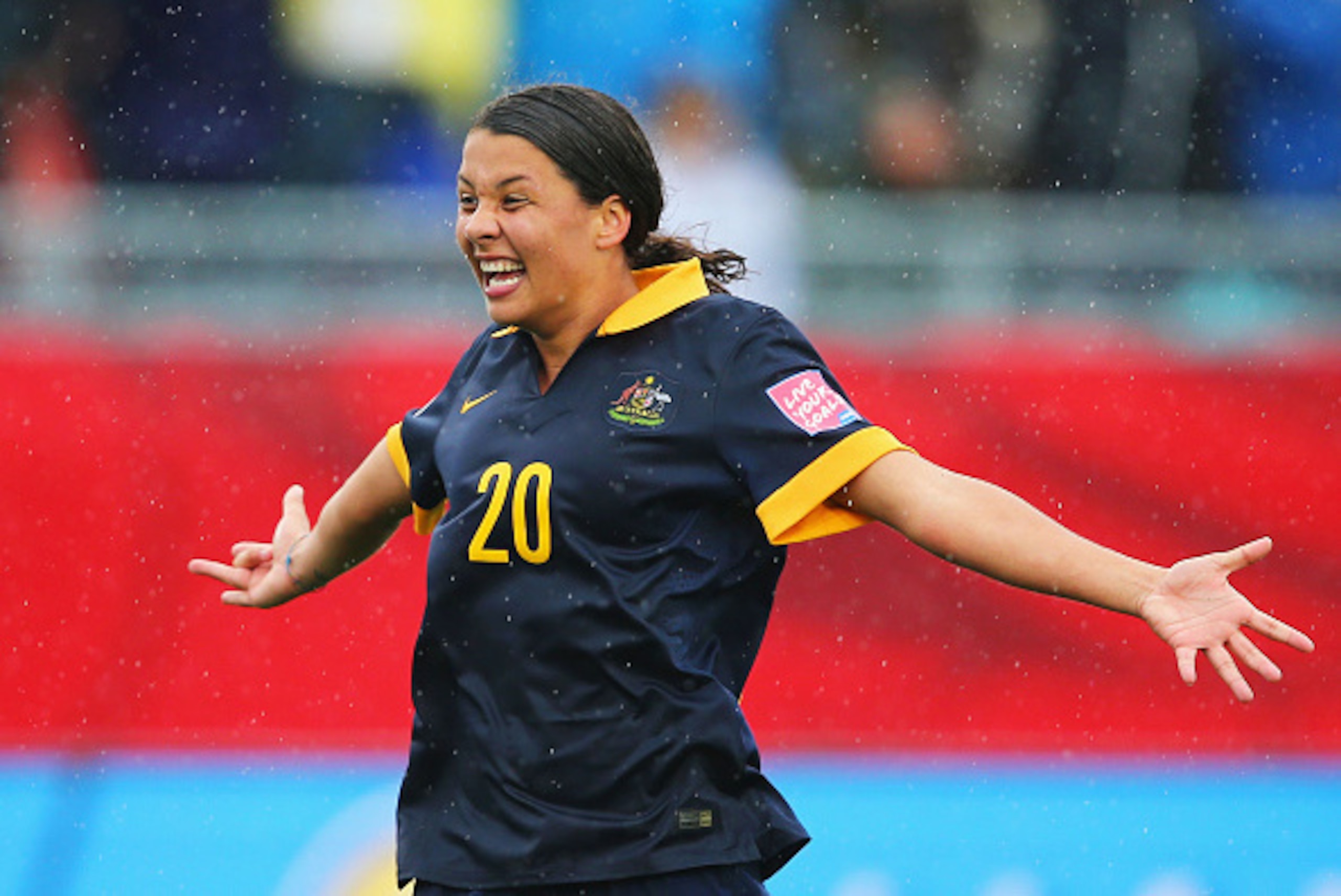 MONCTON, NB - JUNE 21:  Samantha Kerr of Australia celebrates victory after the FIFA Women's World Cup 2015 round of 16 match between Brazil and Australia at Moncton Stadium on June 21, 2015 in Moncton, Canada. Australia reach the quarter finals with a 1-