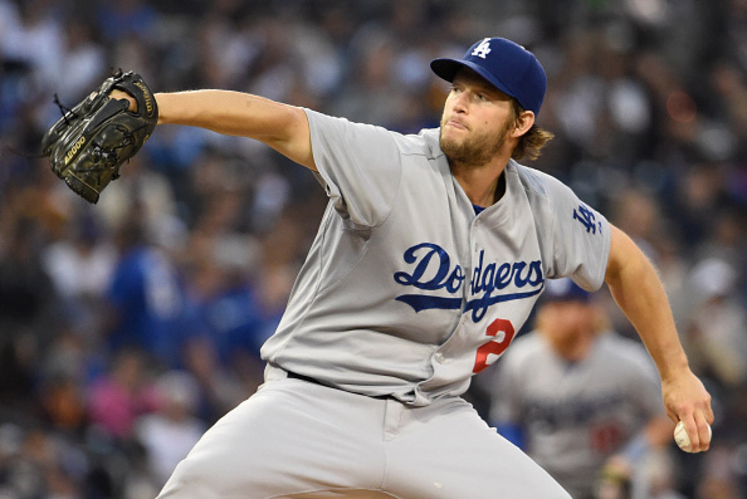 SAN DIEGO, CA - JUNE 12:  Clayton Kershaw #22 of the Los Angeles Dodgers pitches during the second inning of a baseball game against the San Diego Padres at Petco Park June 12, 2015 in San Diego, California.  (Photo by Denis Poroy/Getty Images)