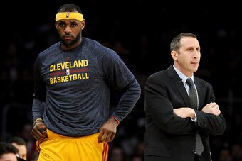 LOS ANGELES, CA - JANUARY 15:  LeBron James #23 of the Cleveland Cavaliers returns to the court behind Head Coach David Blatt of the Cleveland Cavaliers during a 109-102 win over the Los Angeles Lakers at Staples Center on January 15, 2015 in Los Angeles,