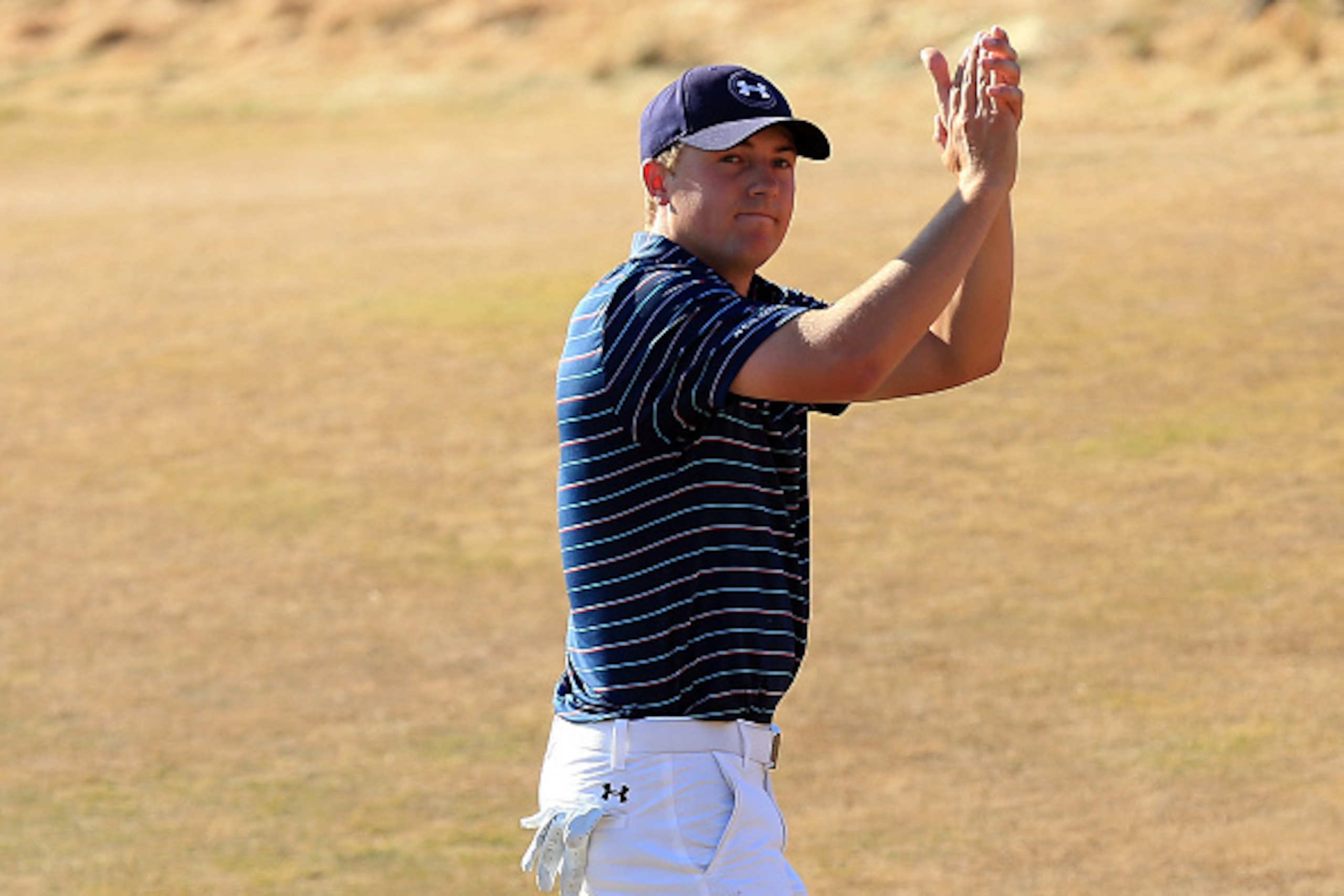 UNIVERSITY PLACE, WA - JUNE 21:  Jordan Spieth of the United States waves to the gallery after a birdie on the 18th green during the final round of the 115th U.S. Open Championship at Chambers Bay on June 21, 2015 in University Place, Washington.  (Photo 