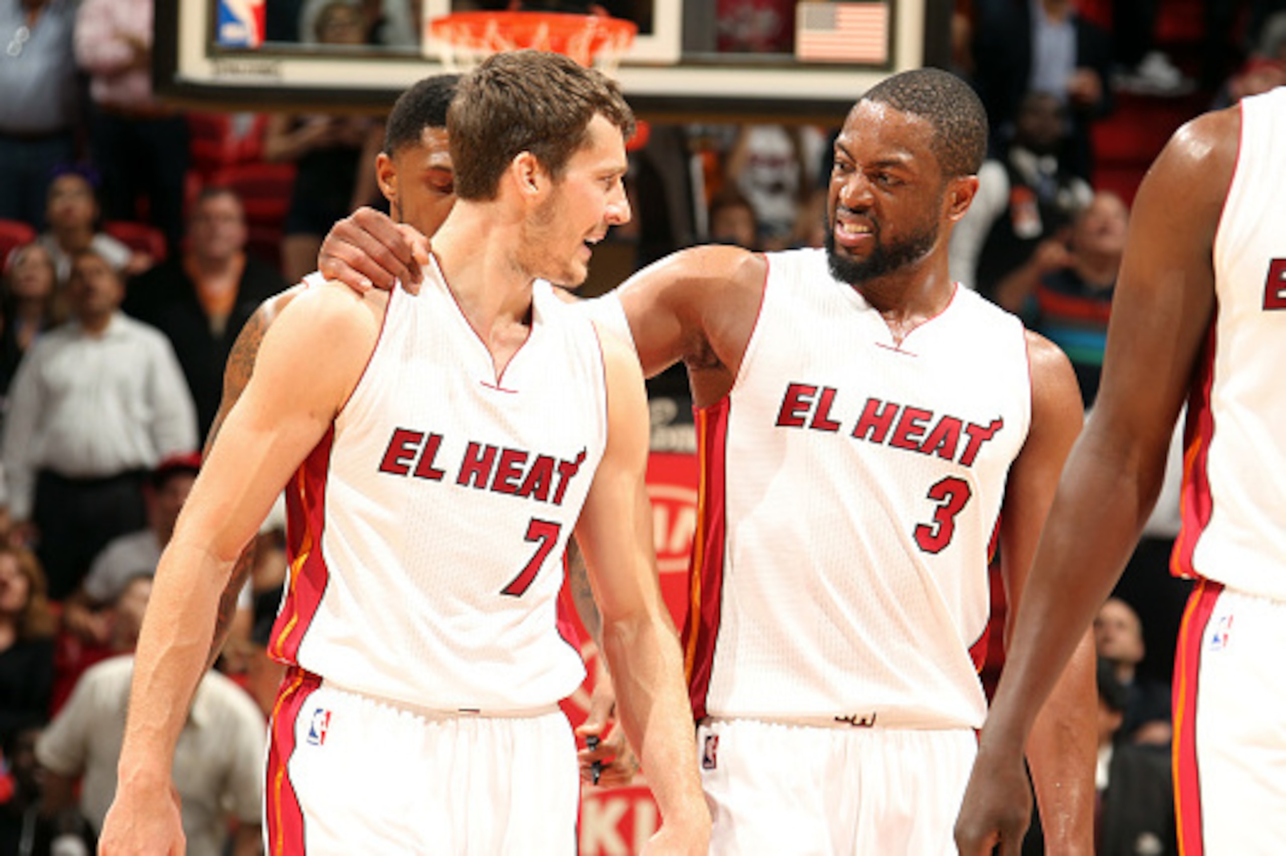 MIAMI, FL - MARCH 2: Goran Dragic #7 and Dwyane Wade #3 of the Miami Heat celebrate during a game against the Phoenix Suns on March 2, 2015 at American Airlines Arena in Miami, Florida.  NOTE TO USER: User expressly acknowledges and agrees that, by downlo