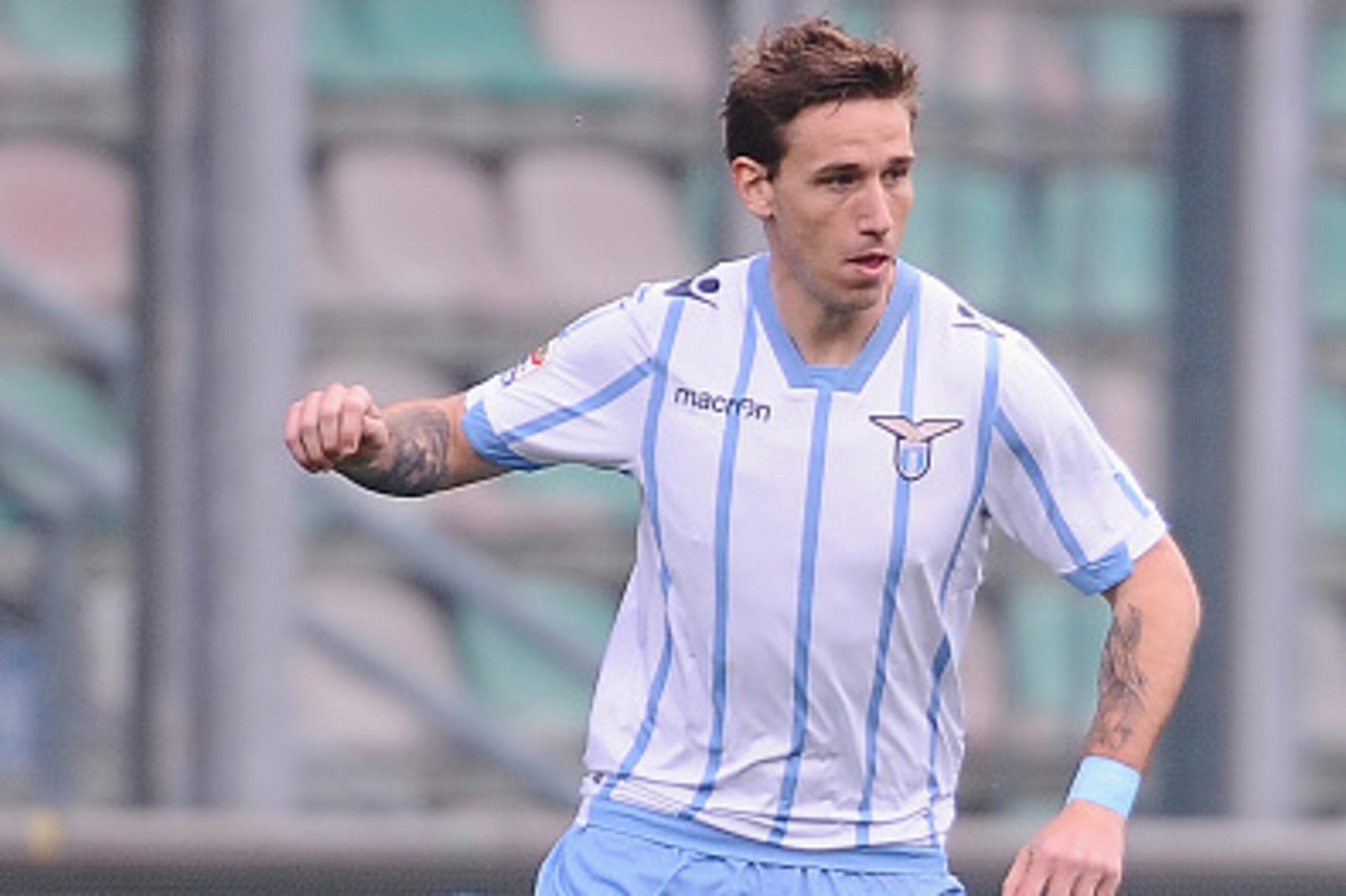 REGGIO NELL'EMILIA, ITALY - MARCH 01:  Lucas Biglia # 20 of SS Lazio in action  during the Serie A match between US Sassuolo Calcio and SS Lazio on March 1, 2015 in Reggio nell'Emilia, Italy.  (Photo by Mario Carlini / Iguana Press/Getty Images)