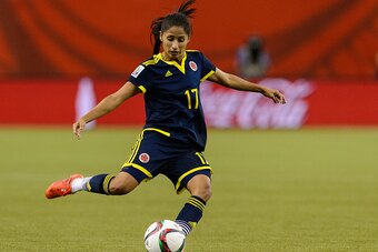 MONTREAL, QC - JUNE 17:  Carolina Arias #17 of Colombia kicks the ball during the 2015 FIFA Women's World Cup Group F match against England at Olympic Stadium on June 17, 2015 in Montreal, Quebec, Canada.  England defeated Colombia 2-1. (Photo by Minas Pa