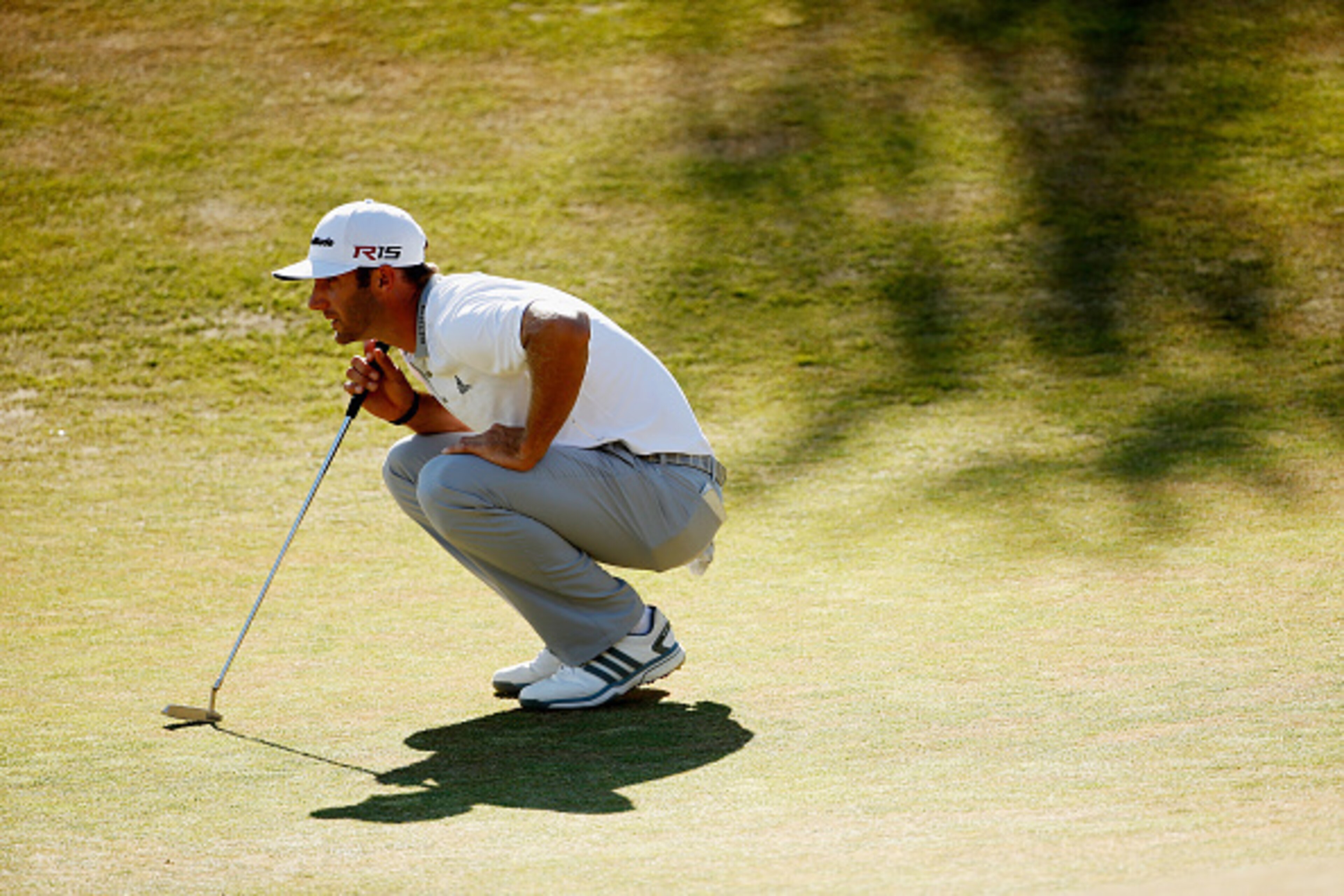 UNIVERSITY PLACE, WA - JUNE 21:  Dustin Johnson of the United States on the 12th green during the final round of the 115th U.S. Open Championship at Chambers Bay on June 21, 2015 in University Place, Washington.  (Photo by Ezra Shaw/Getty Images)